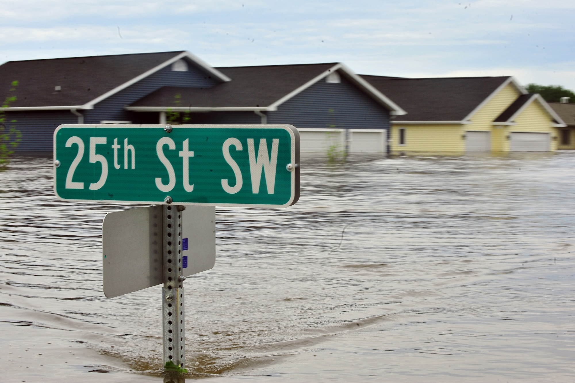 MINOT, N.D. – Approximately 10 feet of water flooded nearly 20 percent of the neighborhood throughout the city, leaving more than 4,000 homes inundated by the flooding here, June 25. With the Souris River expected to crest, city officials scramble to implement a recovery strategy hoping to endure the high water preventing the loss of thousands of homes already damaged by flooding. At 8 feet above the major flood stage, the water appears to be leveling off. (U.S. Air Force photo/Senior Airman Jesse Lopez)