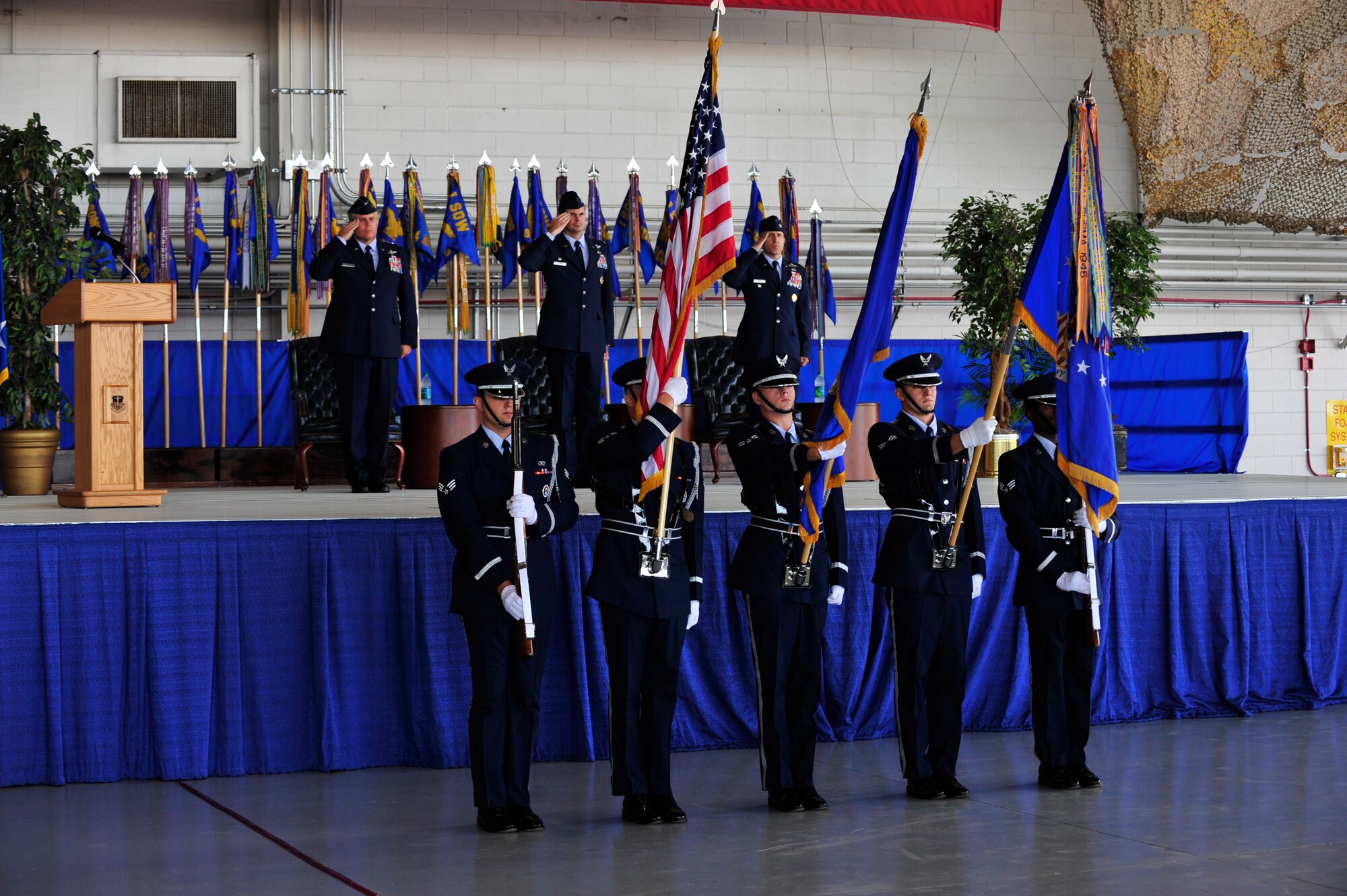 The Hurlburt Field Honor Guard posts the colors during the 1st Special Operations Wing change of command ceremony at Hurlburt Field, Fla., June 29, 2011. Col. Michael Plehn relinquished command of the 1st SOW to Col. James Slife. (U.S. Air Force photo by Staff Sgt. Stephanie Jacobs/Released) 


