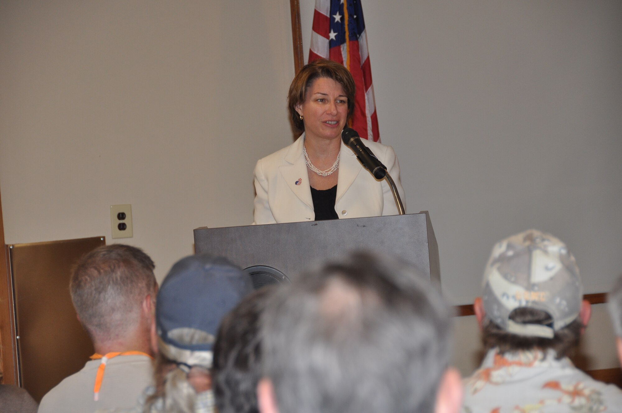 Senator Amy Klobuchar speaks at the Minnesota Veterans Memorial Wall dedication at the Fort Snelling Officer's Club June 11. The wall honors Minnesota military members killed in action since 9/11. (Air Force Photo/Paul Zadach) 