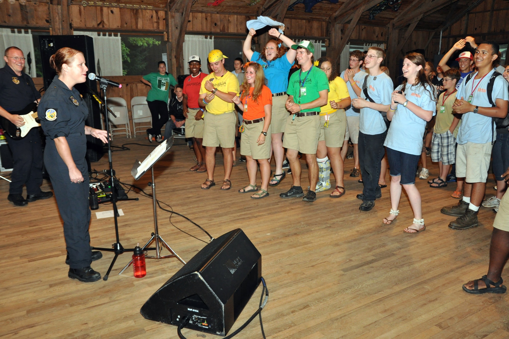 DAHLONEGA, Ga. -- Airman 1st Class Jill Marie Diem, vocalist with the Band of the U.S. Air Force Reserve, gets the crowd started at the Classic Teen Leadership Summit at the Wahsega 4-H Center in Dahlonega, Ga., June 22. (U.S. Air Force photo/Senior Airman Megan Tomkins)