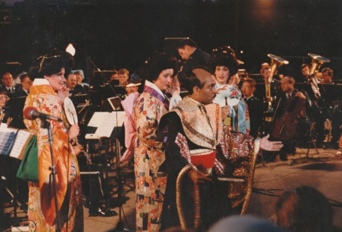 Members of the USAF Singing Sergeants perform The Mikado in costume with the Concert Band accompanying.  If you have additional information about this photo, please email <a href="mailto:USAFBandHistorian@afncr.af.mil">The USAF Band Historian</a> . We look forward to hearing from you.  This is photo 47. (unknown photographer).
