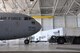 WRIGHT-PATTERSON AIR FORCE BASE, Ohio – Staff Sgt. Bill Burdick, 445th Aircraft Maintenance Squadron, tows a 445th Airlift Wing C-17 Globemaster III out of the hangar to the flightline June 29. (U.S. Air Force photo/Stacy Vaughn)