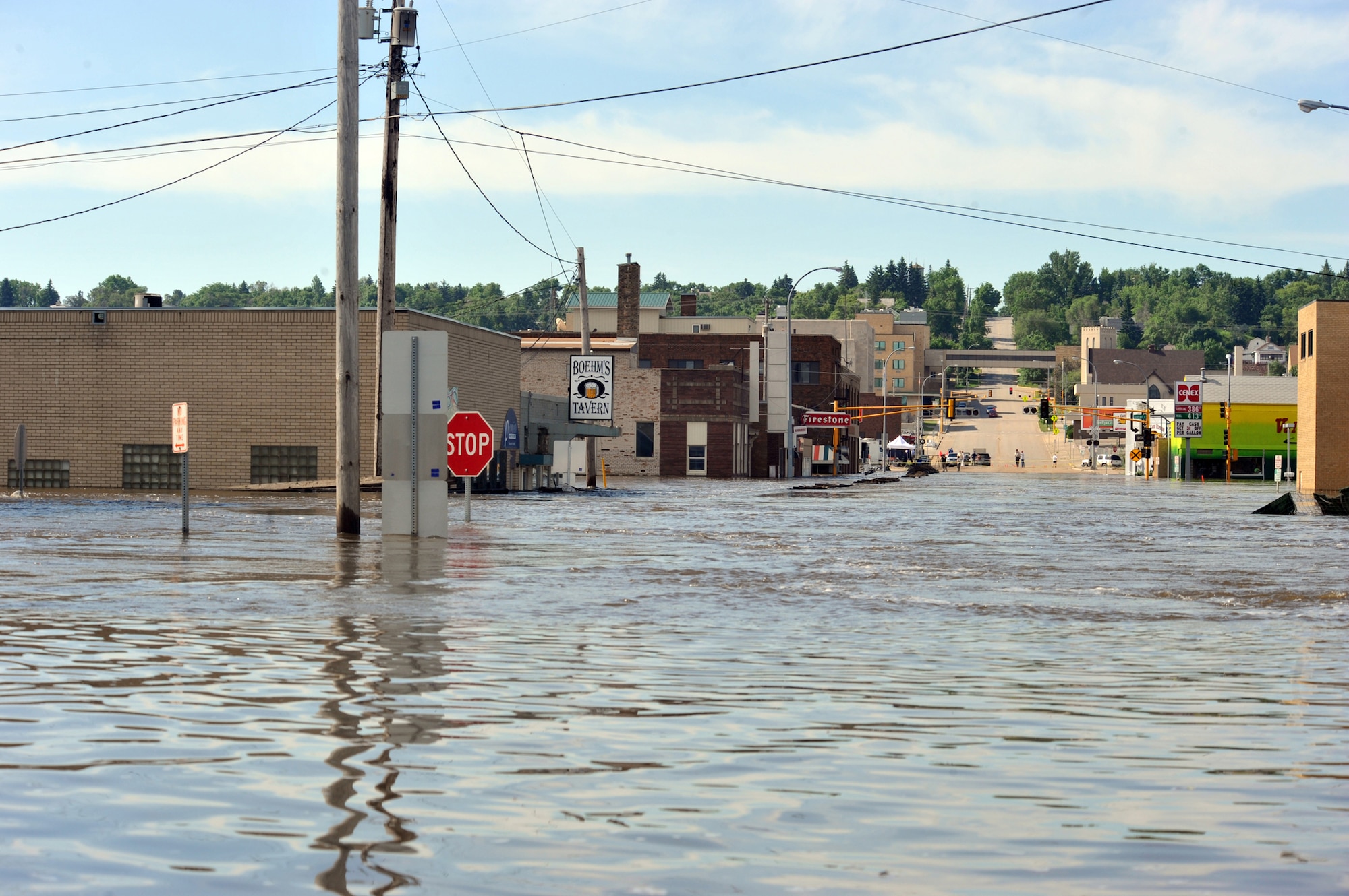 MINOT, N.D. – The scene from inside the levee system around Minot leaves little question as to the devastating effects of flood waters on homes and businesses here, Jun. 25. With water levels staying steady, the city of Minot has a long way to go until recovery can begin. (U.S. Air Force photo/Staff Sgt. Keith Ballard)