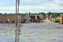 MINOT, N.D. – The scene from inside the levee system around Minot leaves little question as to the devastating effects of flood waters on homes and businesses here, Jun. 25. With water levels staying steady, the city of Minot has a long way to go until recovery can begin. (U.S. Air Force photo/Staff Sgt. Keith Ballard)
