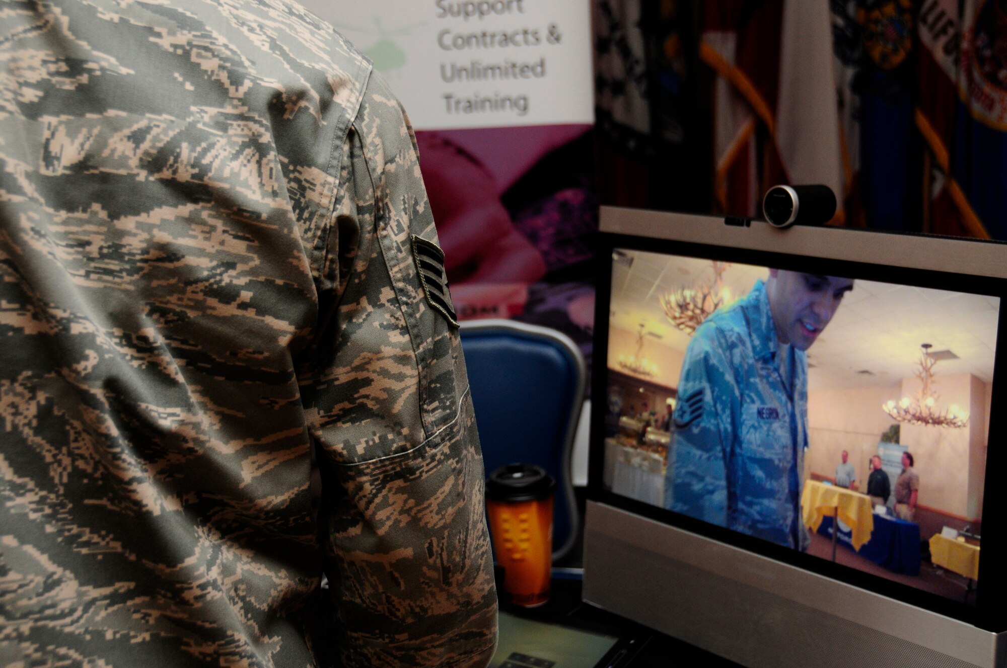 Staff Sgt. Christian Negron tests a video camera response on a monitor June 23, 2011, Eielson Air Force Base, Alaska.  Technology Demo Day and similar events serve as an opportunity to update resources to enhance future capabilities.  Sergeant Negron is a sensitive compartmentalized information assurance officer assigned to the 354th Fighter Wing.  (U.S. Air Force photo by Airman 1st Class Yash Rojas)