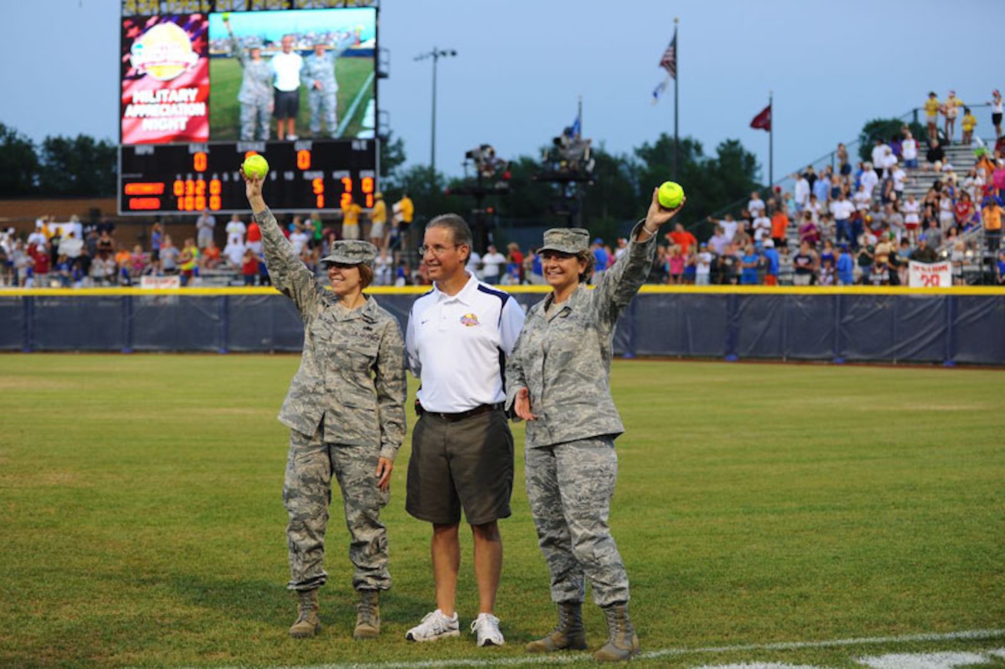 A military appreciation night featuring members of the Air Force Reserve and 507th Air Refueling Wing were held recently during the national women’s softball championship games held in Oklahoma City.  The NCAA recognized two of the highest ranking female leaders serving at Tinker Air Force Base in Oklahoma City, Colonel Marcia Walker, Senior Individual Mobilization Augmentee to the Director, Aerospace Sustainment Directorate, Oklahoma City Air Logistics Center, and Chief Master Sergeant Tina Long, Command Chief Master Sergeant, 507th Air Refueling Wing.  The presentation was made by Scott Farmer, Athletics Director at the University of Louisiana at Lafayette and Chair of the NCAA Division I Softball Committee.