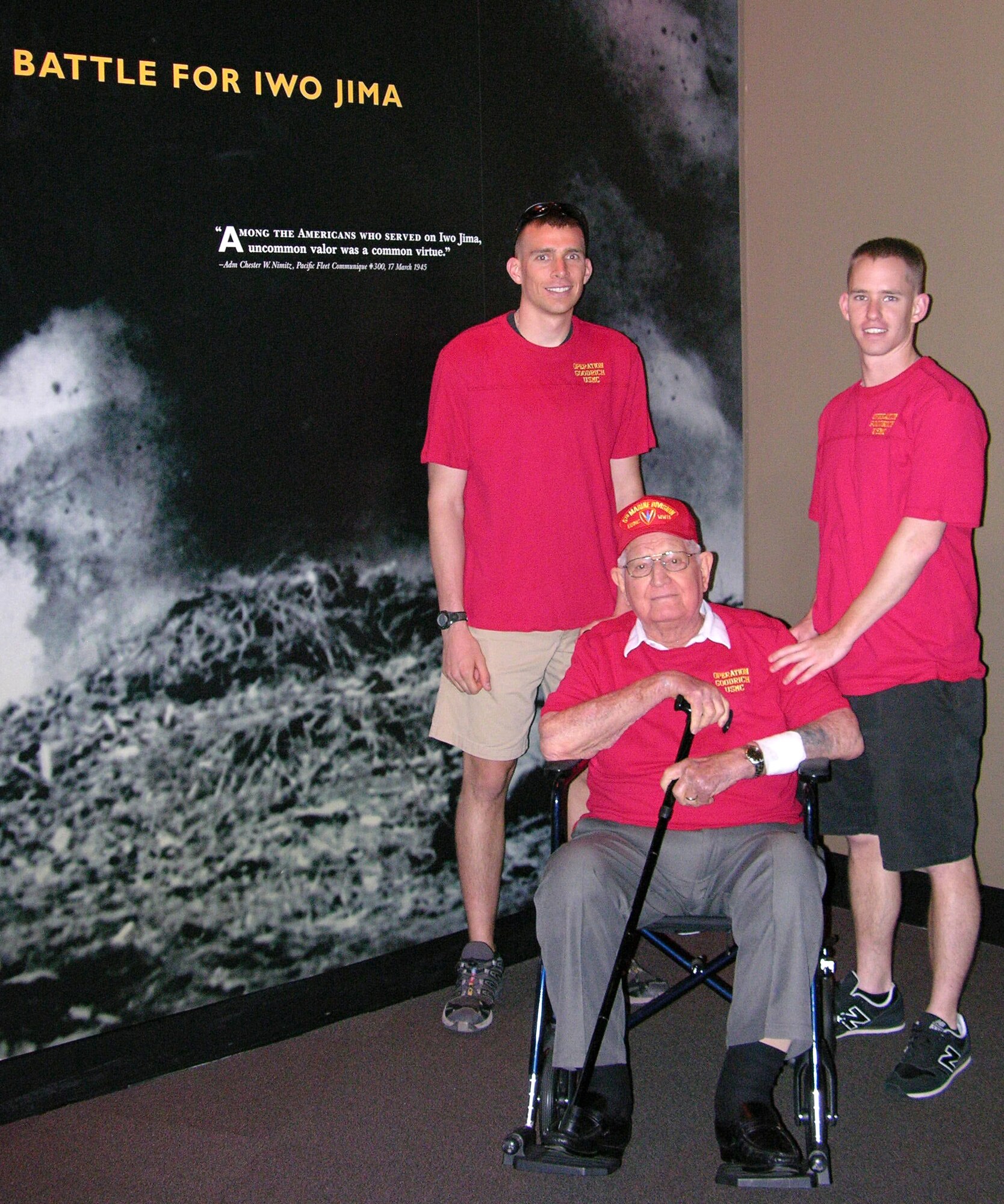Vance Marine student pilots, 1st Lts. Christopher Merrick, left, and Christopher Ryan, right, pause with Enid, Okla., resident, Jim Goodrich, at the Battle for Iwo Jima display in the Marine Corps War Memorial in Washington, D.C., over the Memorial Day weekend. As an 18-year-old Marine corporal, Mr. Goodrich survived the World War II battle. (Courtesy photo)