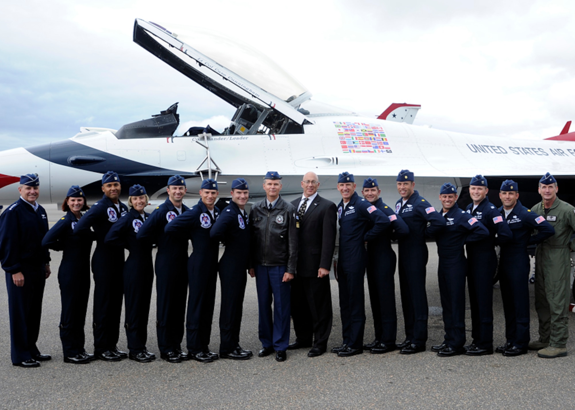The U.S. Air Force Thunderbirds pose for a photograph with the U.S. Ambassador to Finland, Bruce J. Oreck, at Turku Air Base, Finland, June 18, 2011. The Thunderbird visit marks the first time in the team's 58-year history to fly in Finland. (U.S. Air Force photo by Staff Sgt. Richard Rose Jr./Released)