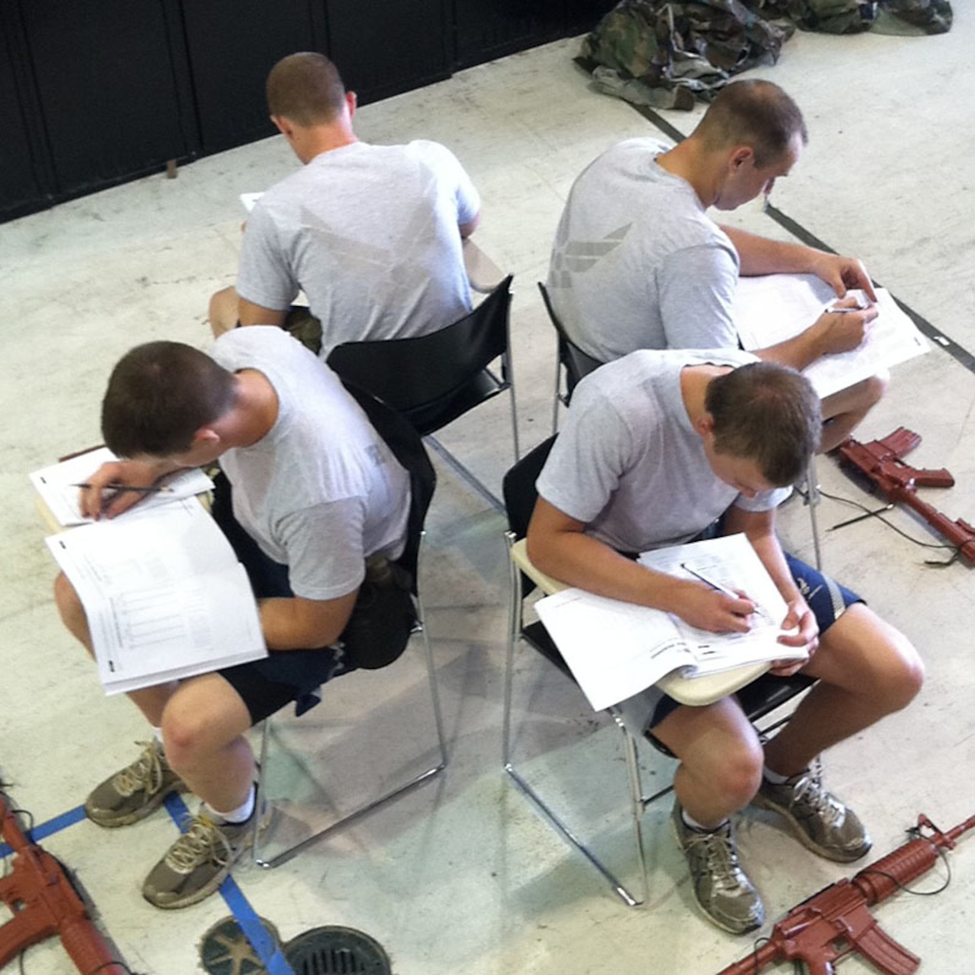 TACP Candidates complete an arithmetic reasoning test in between physical training events.  Photo by SSgt Eason, ASOS