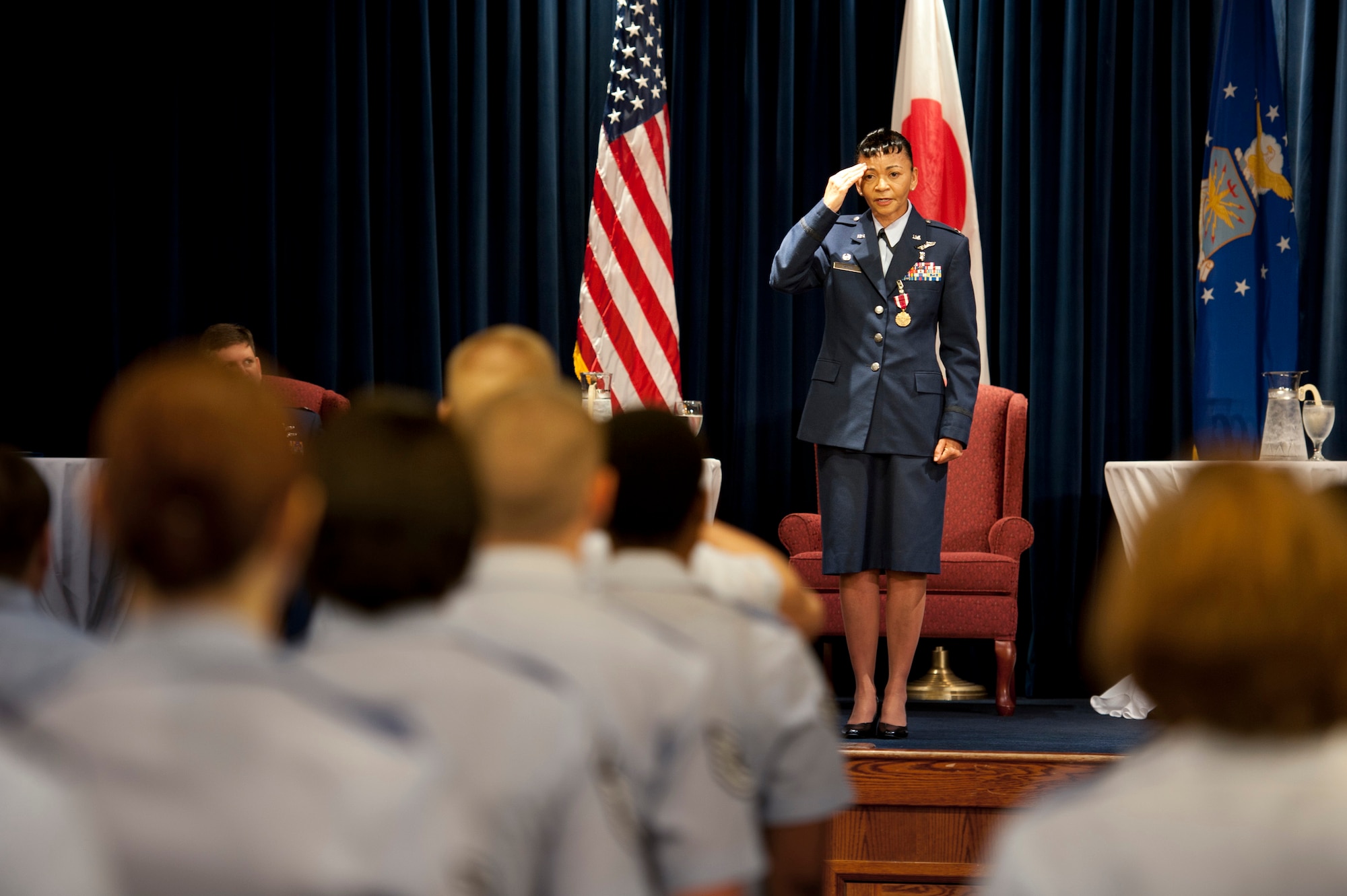 YOKOTA AIR BASE, Japan -- Col. Christine Taylor, 374th Medical Surgical Squadron commander, gives a final salute to her squadron during a change of command ceremony here June 23, 2011. (U.S. Air Force photo/Staff Sgt. Samuel Morse)