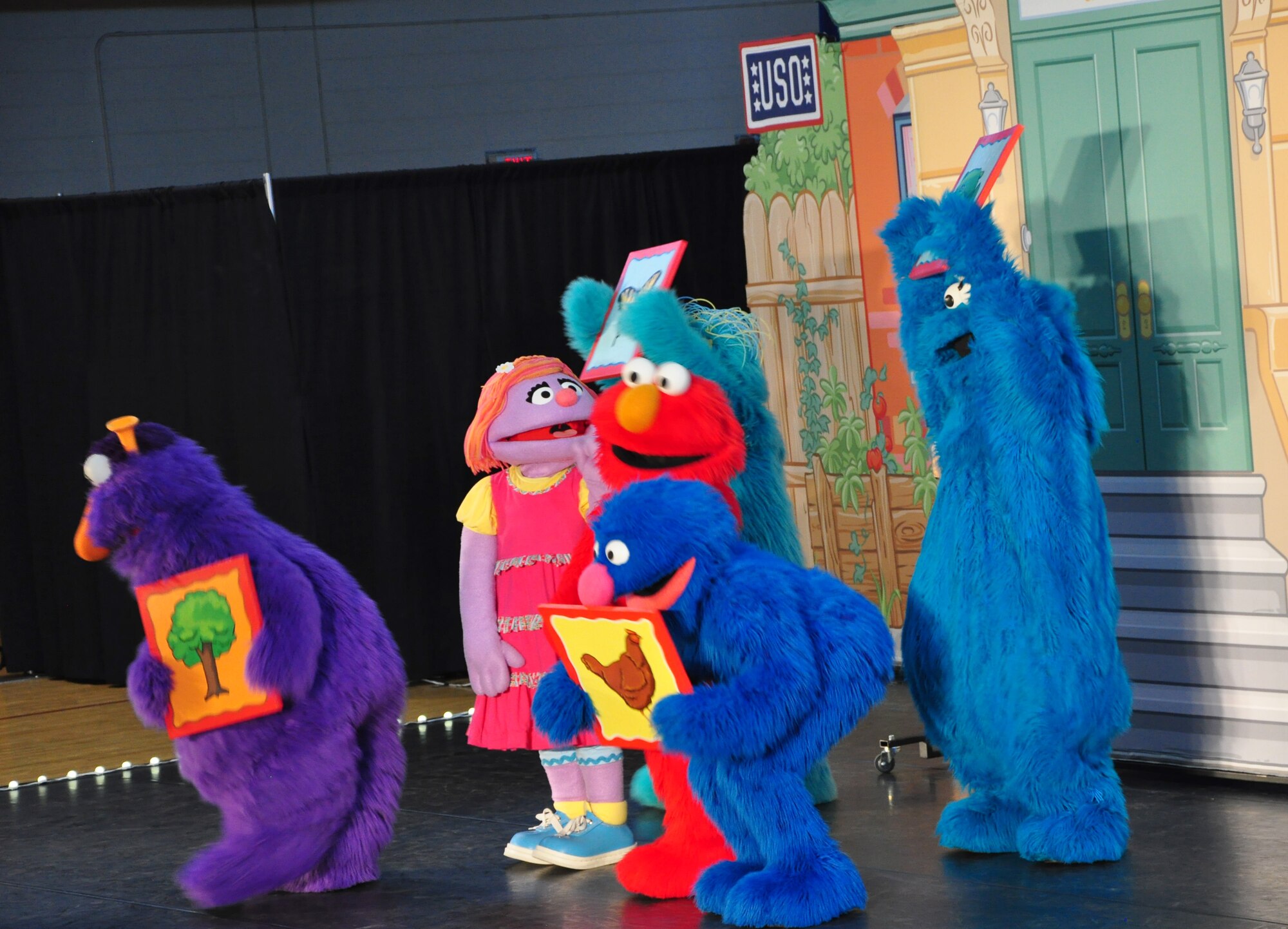 The USO-hosted Sesame Street show made a stop here June 29. This free show, exclusively for military children and their families, features Elmo and his friends Rosita, Cookie Monster, Grover, and their new friend Katie, a military kid who is moving to a new place. The tour is part of Sesame Street's Talk, Listen, Connect initiative for military families. (U.S. Air Force photo/Staff Sgt. Chad Thompson)