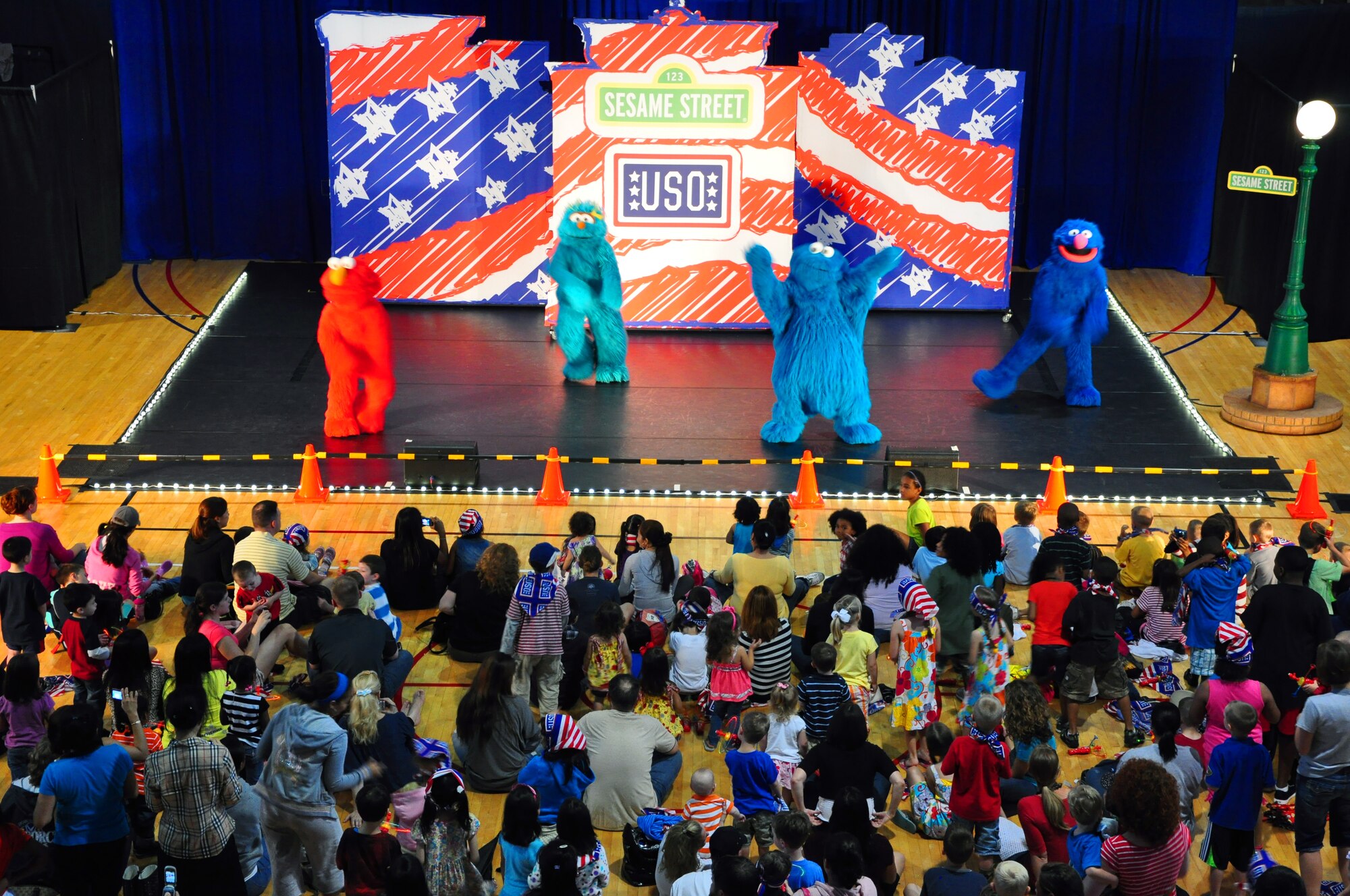 The USO-hosted Sesame Street show made a stop here June 29. This free show, exclusively for military children and their families, features Elmo and his friends Rosita, Cookie Monster, Grover, and their new friend Katie, a military kid who is moving to a new place. The tour is part of Sesame Street's Talk, Listen, Connect initiative for military families. (U.S. Air Force photo/Staff Sgt. Chad Thompson)