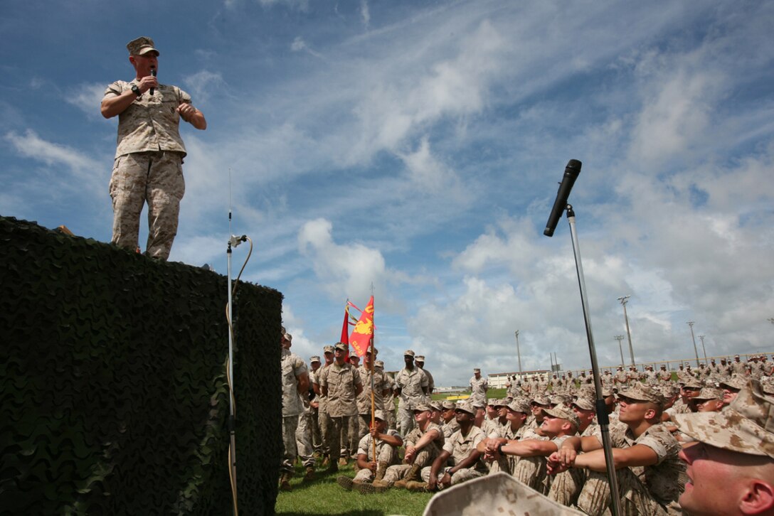 Sgt. Maj. Micheal Barrett, 17th Sergeant Major of the Marine Corps, speaks to Camp Hansen Marines during his visit to Okinawa, Japan, June 13, 2011.