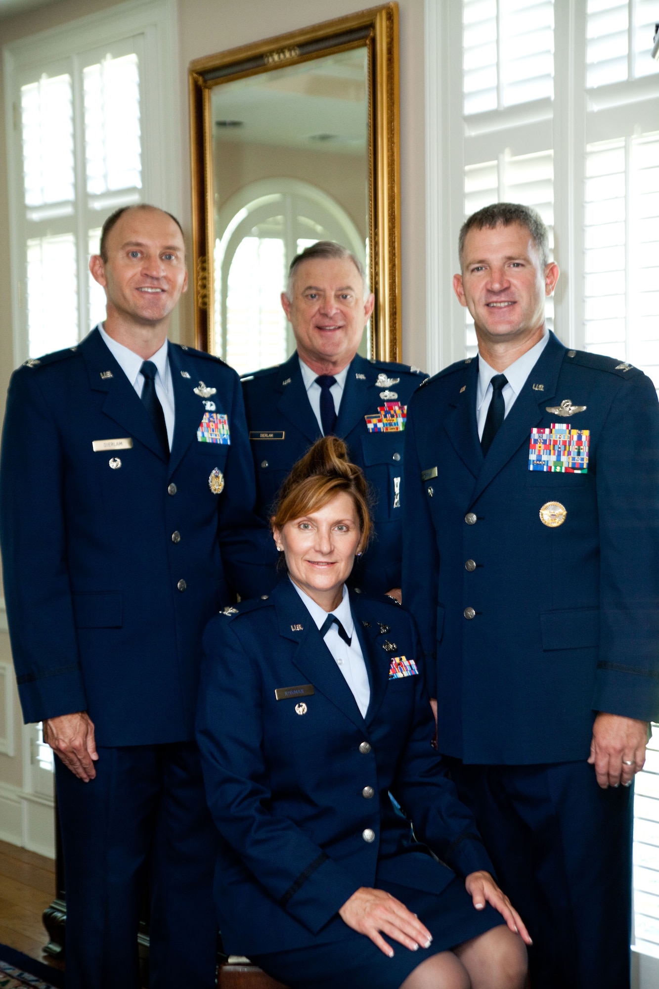 Members of the Dierlam family, each a colonel, pose for a photo after the youngest child, Todd, pinned on the rank of colonel.  Each of the Dierlam children attended the Air Force Academy outside Colorado Springs, Colo., and was commissioned by their father. Featured in the photo from left to right are Col. Todd Dierlam, deployed to the Transit Center at Manas, Kyrgyzstan; Col. Tish Norman, stationed at Lackland Air Force Base, Texas; retired Col. Mark Dierlam and Col. Scott Dierlam, stationed at the Air Force Academy office in Washington, D.C. (Courtesy photo)