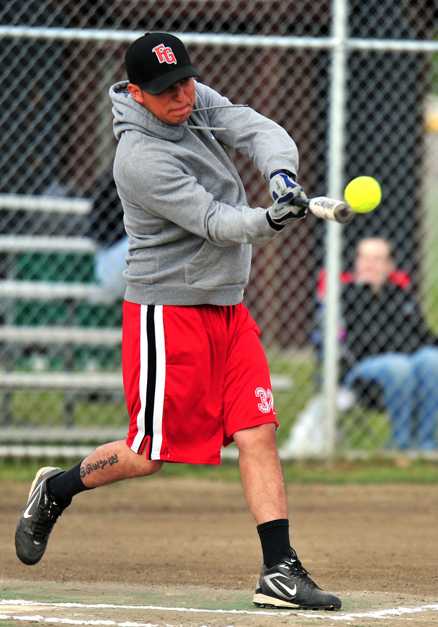JOINT BASE ELMENDORF-RICHARDSON, Alaska???Pfc. Ray Raigoza, 425th Brigade Special Troops Battalion, connects during the intramural softball game between B Company 3rd Battalion (Airborne) 509th Infantry Regiment and 425th Brigade Special Troops Battalion at Joint Base Elmendorf-Richardson, Wednesday, June 22, 2011.  (U.S. Air Force photo/JBER POA, Justin Connaher)