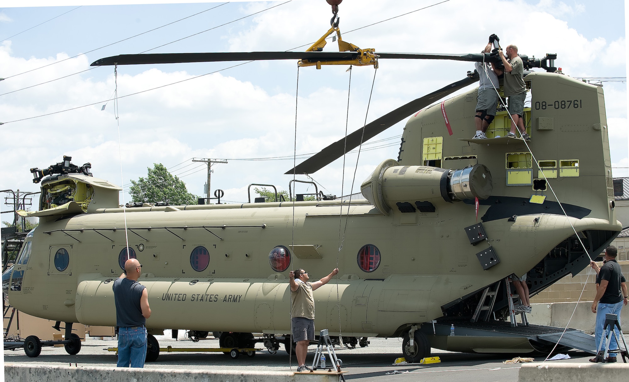 Engineers prepare a CH-47F helicopter for its flight to Millville, N.J., June 30, 2011, at Dover Air Force Base, Del. The helicopter was transported by a C-5M Galaxy to and from the Paris Air Show. Once returned to a completion center in Millville, the Army will take possession of the helicopter. (U.S. Air Force photo by Adrian Rowan)