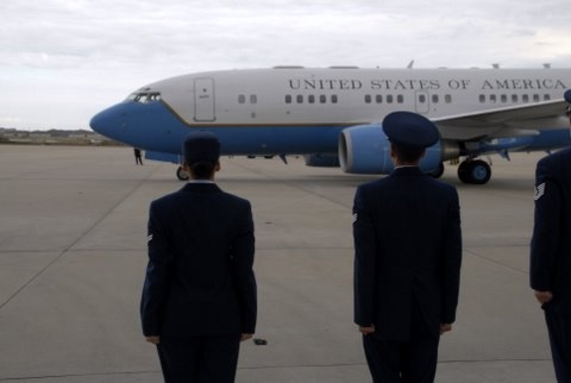 Aerial porters wait on the Joint Base Anderws, Md., flightline to greet Air Force One.  The 41st Aerial Port Squadron, part of the 403rd Wing here, deployed 14 Airmen to Andrews and took over port operations for two weeks June 6-17, 2010 with 37 airmen from the 87th APS, 445th Airlift Wing, Wright-Patterson Air Force Base, Ohio. (U.S. Air Force photo by Master Sgt. Charlie Miller)