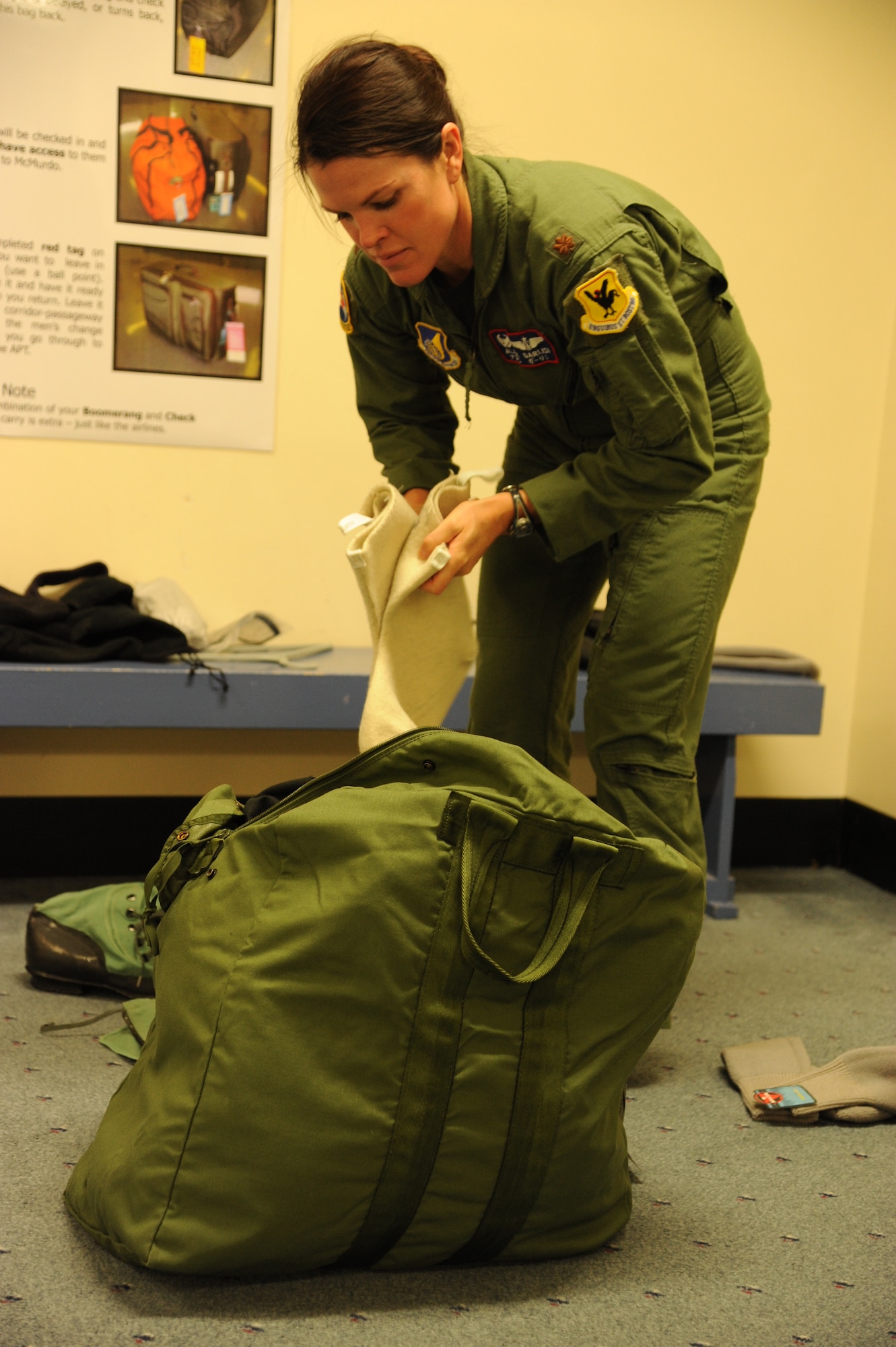 CHRISTCHURCH, New Zealand – Maj Alane Garlisi, 18th Aeromedical Evacuation Squadron detachment commander, suits up in cold weather gear here June 29, in preparation for the medical evacuation of an ailing National Science Foundation government contractor from Antarctica. Major Garlisi is permanently assigned to Joint Base Pearl Harbor-Hickam, currently attached to Joint Task Force-Support Forces Antarctica. She aided in the successful delivery of the NSF contractor from McMurdo Station, Antarctica to Christchurch, June 30. (U.S. Air Force photo/Capt. David Herndon) 