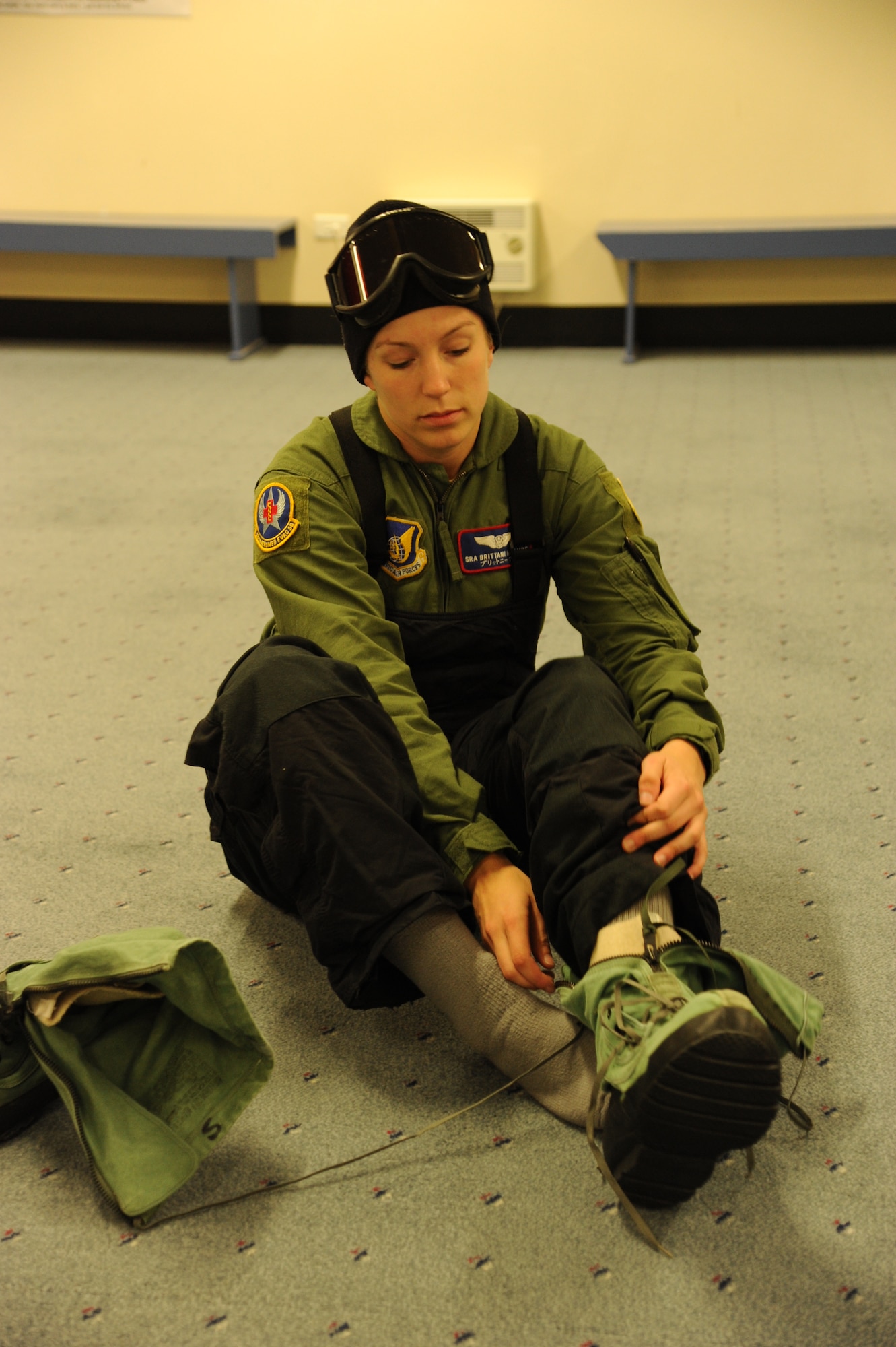 CHRISTCHURCH, New Zealand – Senior Airman Brittini McClure, 18th Aeromedical Evacuation Squadron, suits up in cold weather gear here June 29, in preparation for the medical evacuation of an ailing National Science Foundation government contractor from Antarctica. Airman McClure is a medical technician permanently assigned to Kadena Air Base, Japan, currently attached to Joint Task Force-Support Forces Antarctica. She aided in the successful delivery of the contractor from McMurdo Station, Antarctica to Christchurch, June 30. (U.S. Air Force photo/Capt. David Herndon)