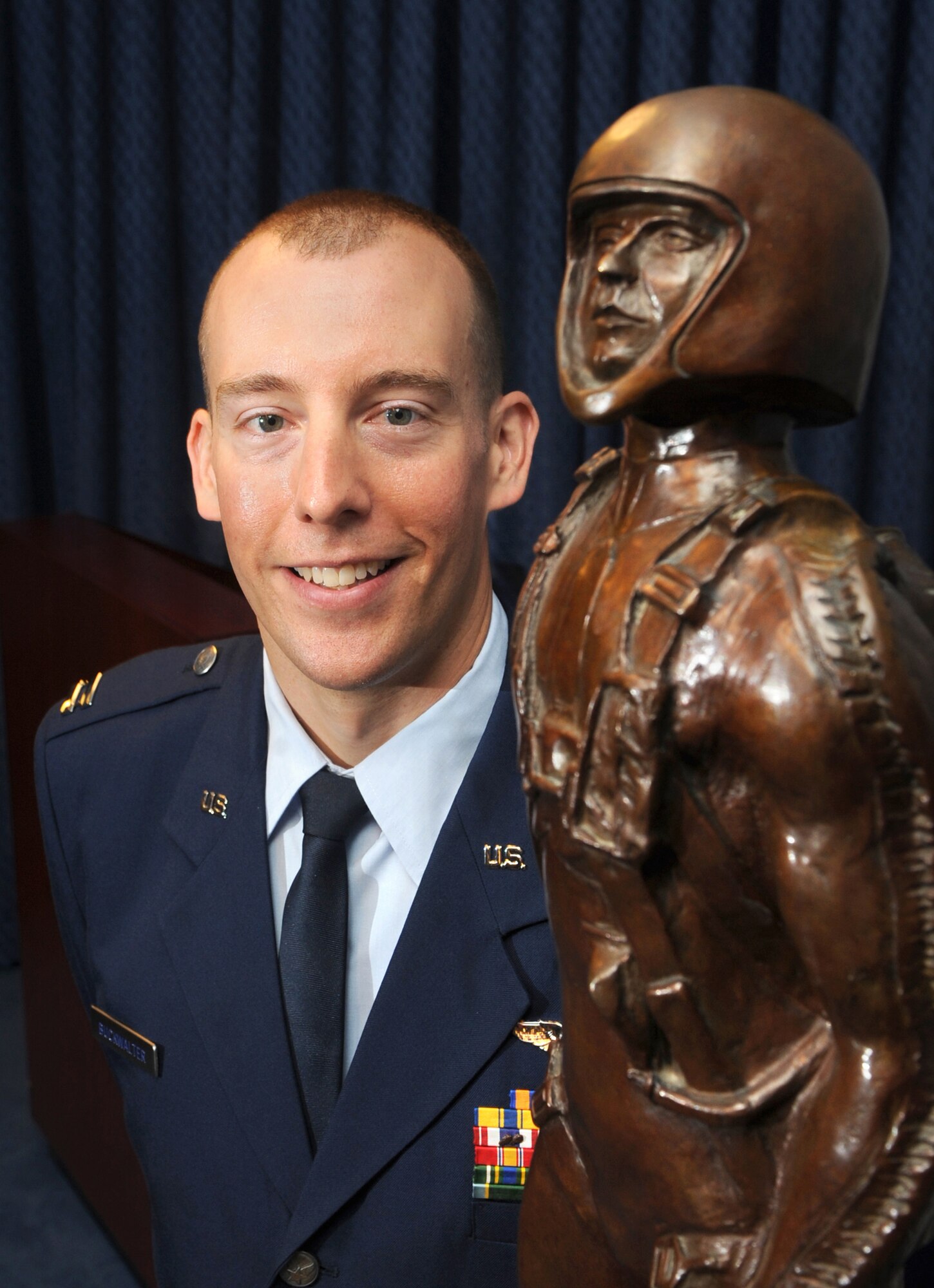 Capt. Hans Buckwalter was named the 2010 recipient of the Koren Kolligian Jr. Trophy June 29, 2011, during a ceremony in the Pentagon. The award recognizes outstanding feats of airmanship by an aircrew member who by extraordinary skill, exceptional alertness, ingenuity or proficiency, averts or minimizes the seriousness of an aircraft accident in terms of injury, loss of life, aircraft or property damage. (U.S. Air Force photo)