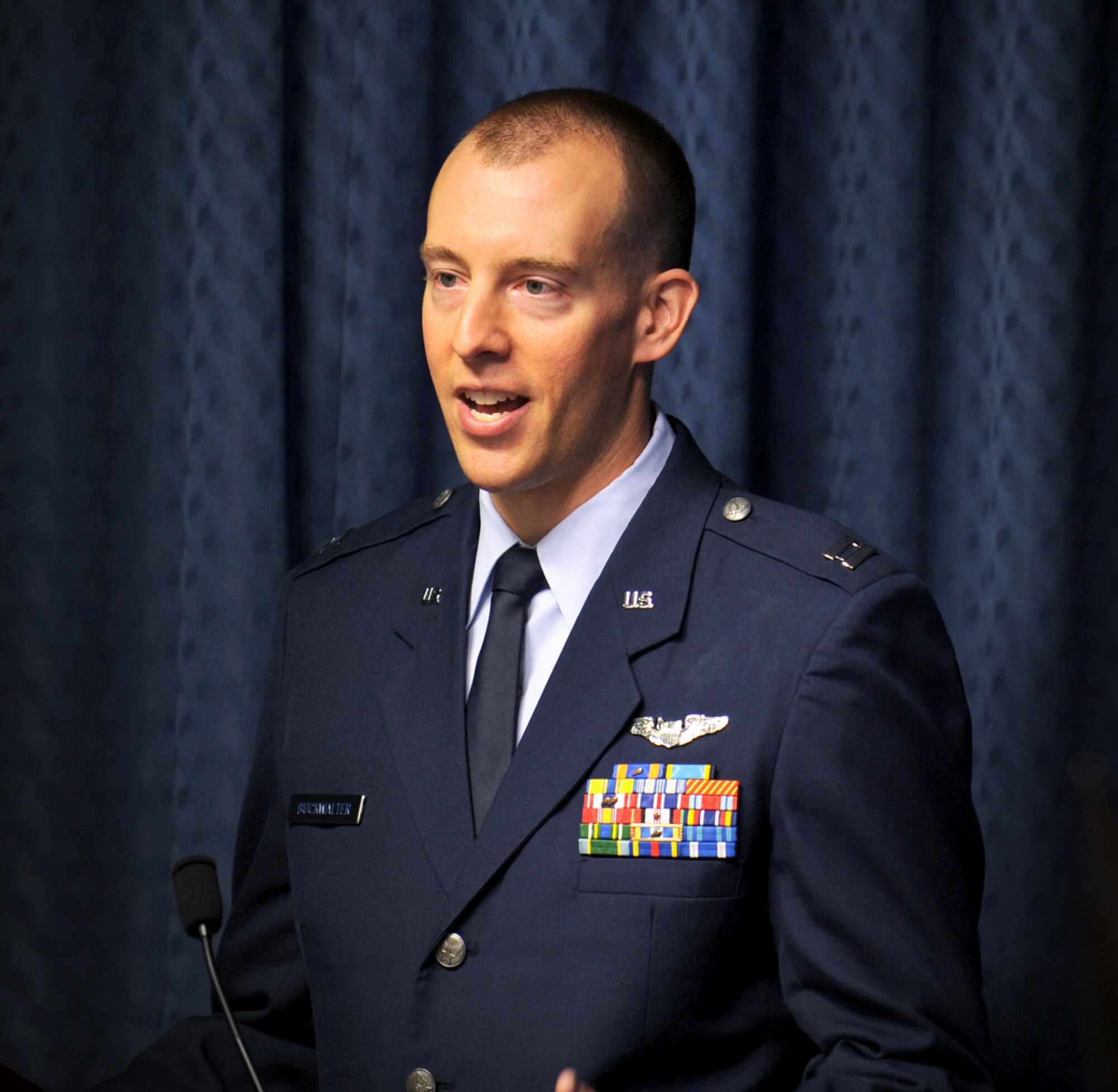 Capt. Hans Buckwalter speaks after receiving the 2010 Koren Kolligian Jr. Trophy June 29, 2011, during a ceremony in the Pentagon. Captain Buckwalter was awarded the trophy, which recognizes outstanding achievement in airmanship and flying proficiency, for his successful landing of an F-15E Strike Eagle with a crippled left landing gear, during a flight April 8, 2010. (U.S. Air Force photo)