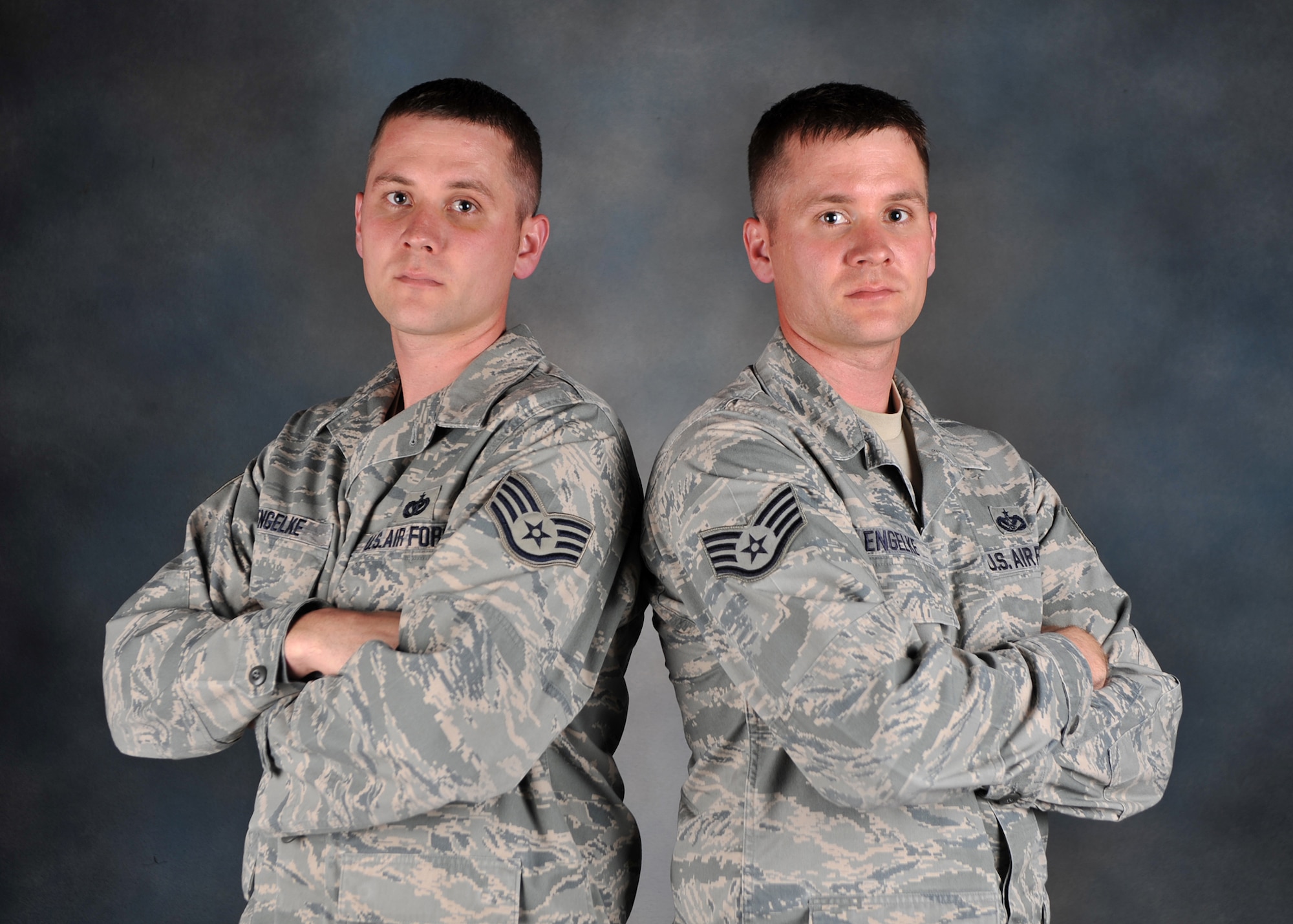 Staff Sergeants Cody and Chris Engelke are twin brothers assigned to the 92nd Civil Engineer Squadron at Fairchild. Cody is a geospatial information and services craftsman and Christopher is a fire protection crew chief and station captain. (U.S. Air Force photo/ Staff Sgt. Micheal Means)