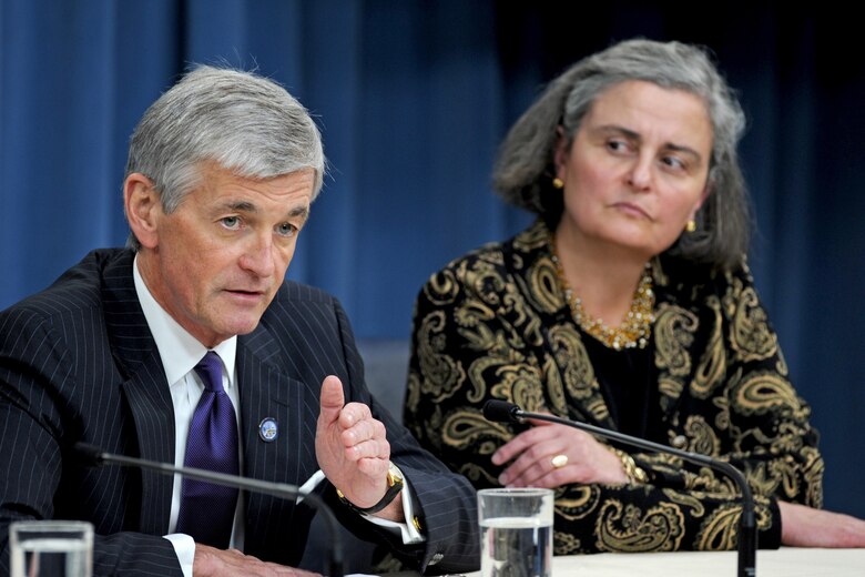 Secretary of the Army John M. McHugh announces at a June 10, 2010, Pentagon press conference that in light of findings of inappropriate practices and mismanagement at Arlington National Cemetery, he is relieving the cemetery's current superintendent and deputy superintendent of their duties and placing Kathryn Condon (right) in the newly created role of executive director of the Army National Cemeteries Program. (Defense Department photo/R. D. Ward)
