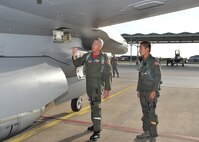 Col. Michael Kelley, 182nd Fighter Squadron, and U.S. Air Force Academy Cadet Cody Hanson, perform a pre-flight inspection on an F-16 Fighting Falcon June 23. Cadet Hanson received an incentive flight while participating in Operation Air Force at Lackland to experience, firsthand, everything an operational Air Force base has to offer. (U.S. Air Force photo/Alan Boedeker)