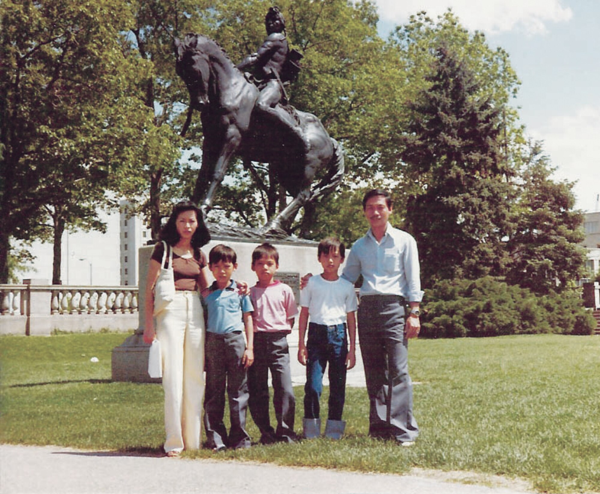 FROM LEFT: Aunt Loc, Lt. Col. Quy Nguyen, 56th Comptroller Squadron commander, brothers Phong and Phu and father, Anh, pose for a photo in downtown Colorado Springs.  (Courtesy photo)