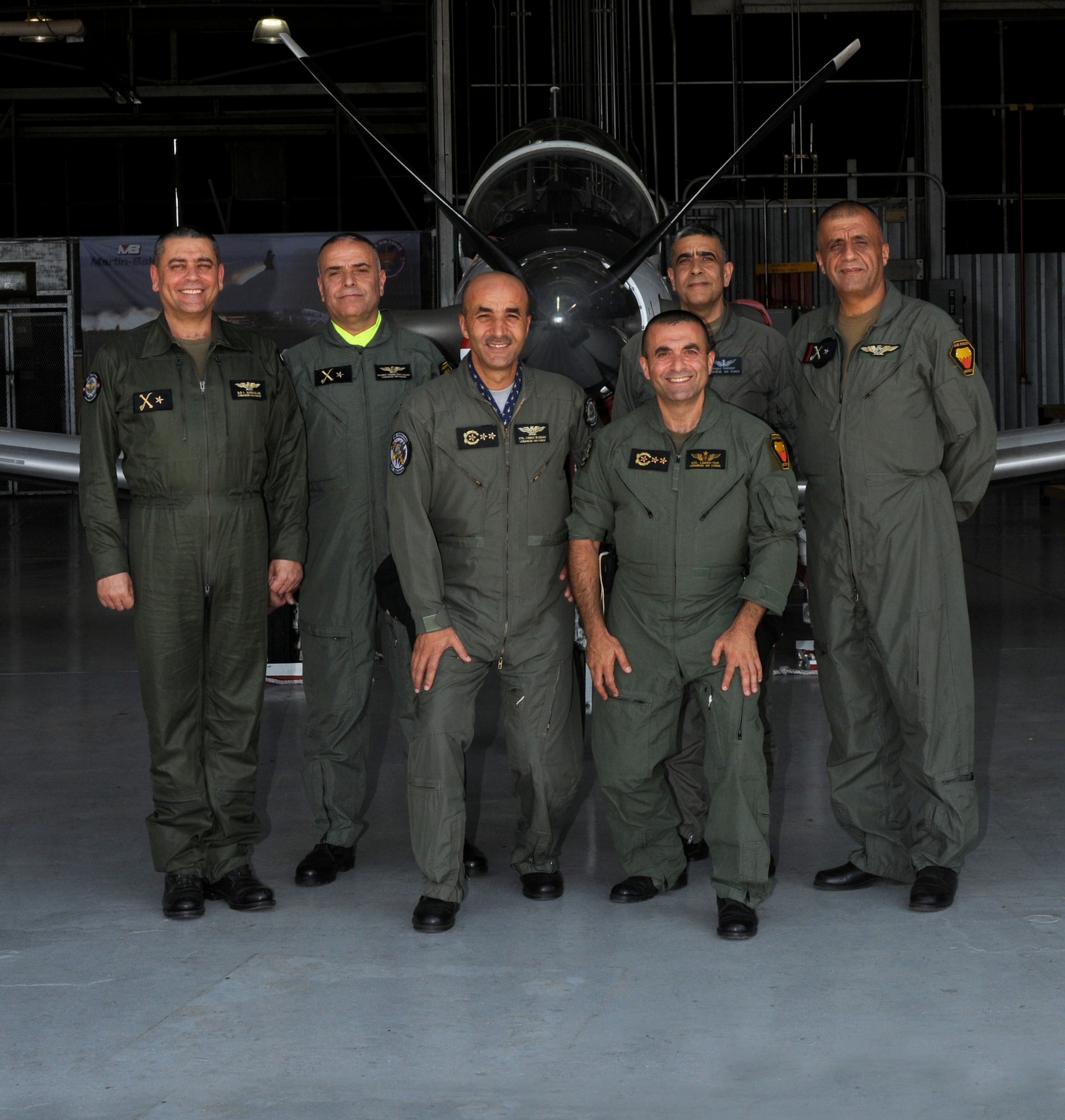 Republic of Lebanon air force vice-chief of staff Brig. Gen. Abdel Rahman Razzac, second from left, stands with a T-6 Texan during their visit to Columbus Air Force Base. The visit’s purpose was to give the team a better understanding of international Specialized Undergraduate Pilot Training. (U.S Air Force photo/Melissa Doublin)