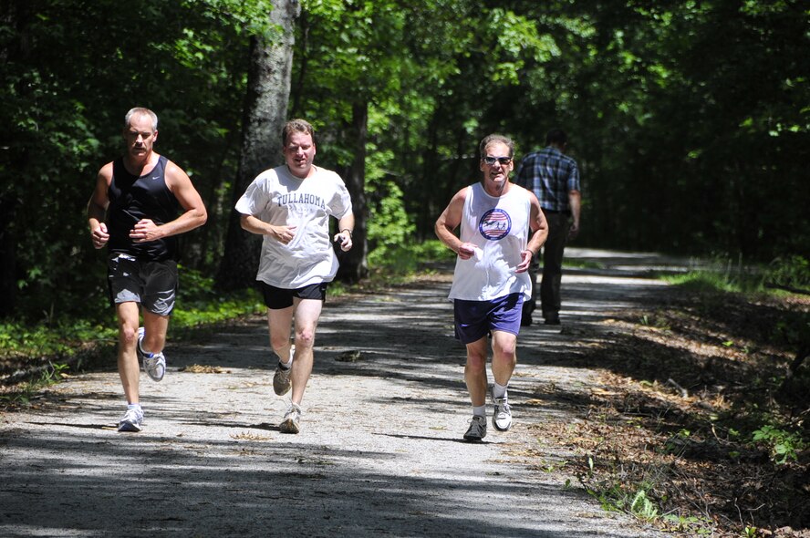 Artie Smith, Kevin Uehlein and Dennis Huprich were among those participating in the 3 ½ mile run, which kicked off the Health and Wellness Expo May 25 at the AEDC Fitness Center. An estimated 275 AEDC employees took advantage of the expo, which featured information booths and class demonstrations.
(Photo by Rick Goodfriend)
