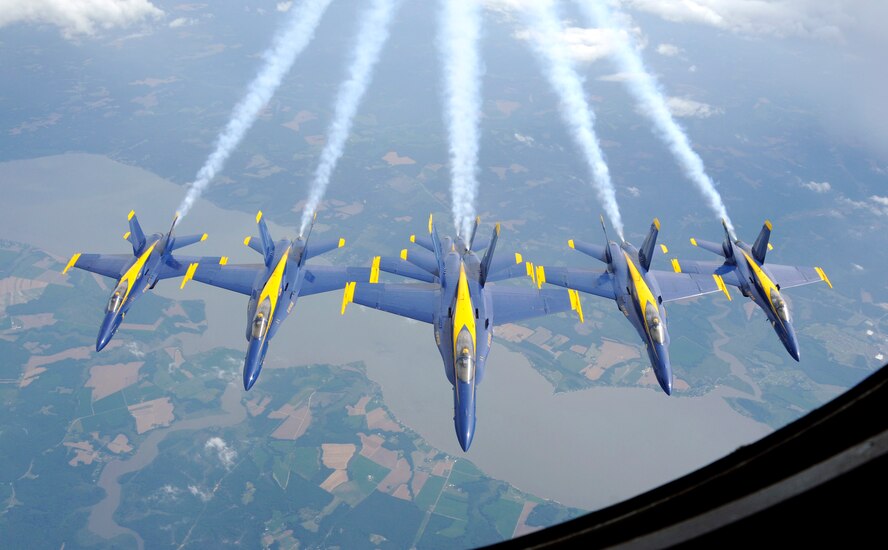 McGHEE TYSON AIR NATIONAL GUARD BASE, Tenn. - U.S. Navy Blue Angels fly in formation after being refueled by a Tennessee Air National Guard KC-135R Stratotanker from the 134th Air Refueling Wing over Delaware, June 22, 2011.  (U.S. Air Force photo by Master Sgt. Kurt Skoglund/Released)