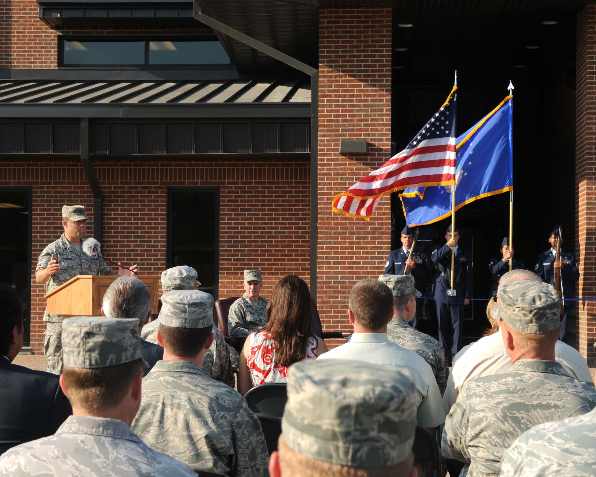 GOODFELLOW AIR FORCE BASE, Texas -- Col. Mark Damiano, 17th Training Wing Commander, speaks at the ribbon cutting ceremony for a new 200-room dormitory June 29. The facility is the first of three dormitory construction projects to be completed here. (U.S. Air Force photo/Staff Sgt. Heather L. Rodgers)
