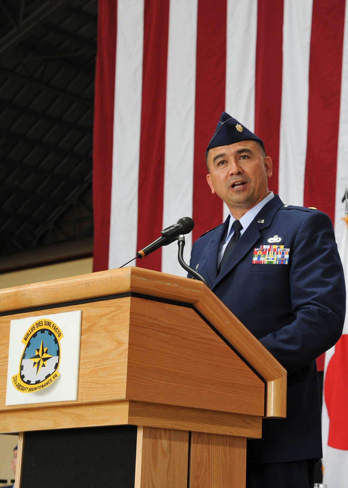 YOKOTA AIR BASE, Japan -- Maj. Danny K. Makalena, 374th Aircraft Maintenance Squadron commander, addresses his squadron for the first time here June 28, 2011, Yokota Air Base, Japan. The 374th AMXS is one of three squadrons within the 374th Maintenance Group. (U.S. Air Force photo/Senior Airman Andrea Salazar)