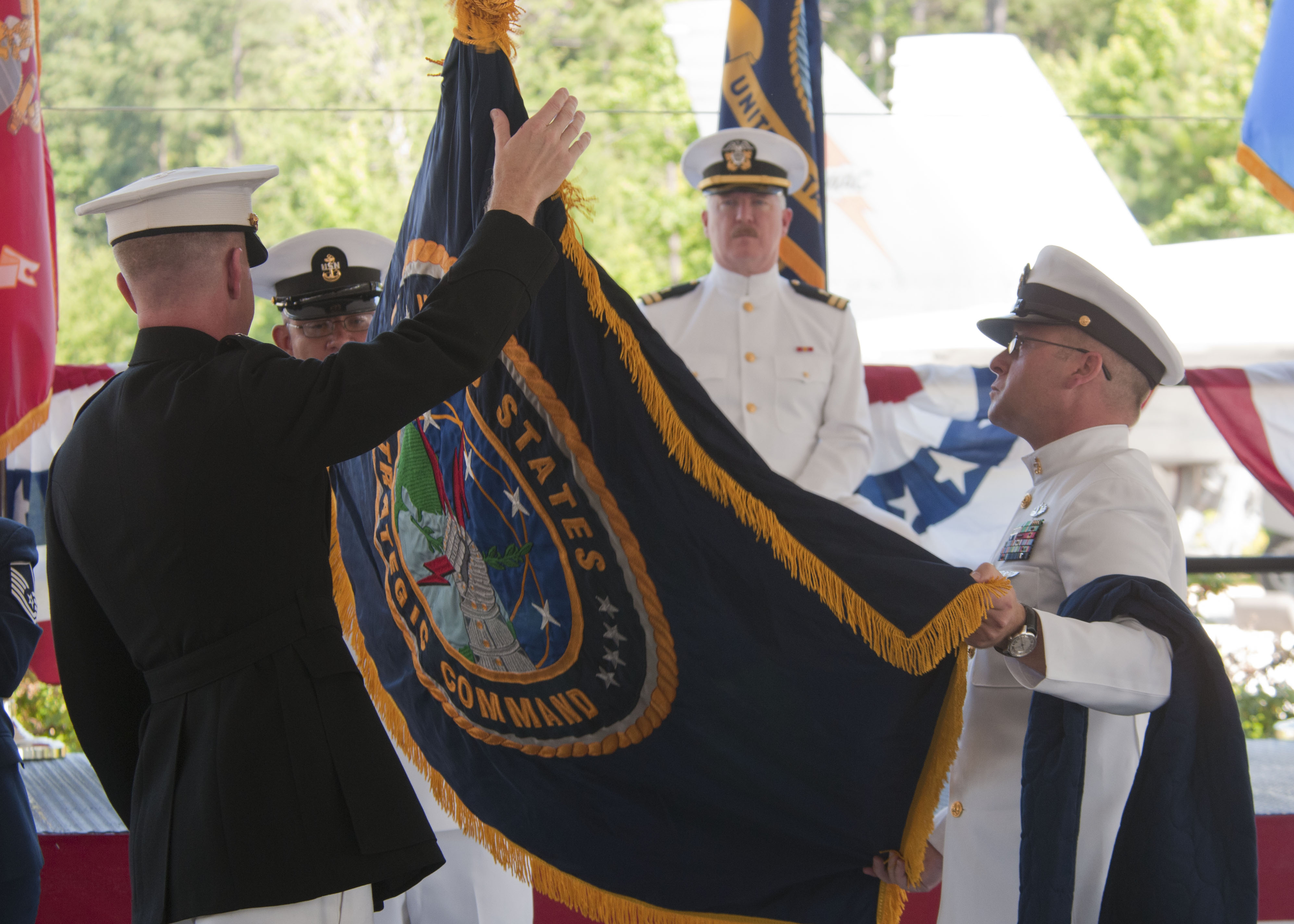 The U.S. Strategic Command flag is unfurled at the Joint Warfare