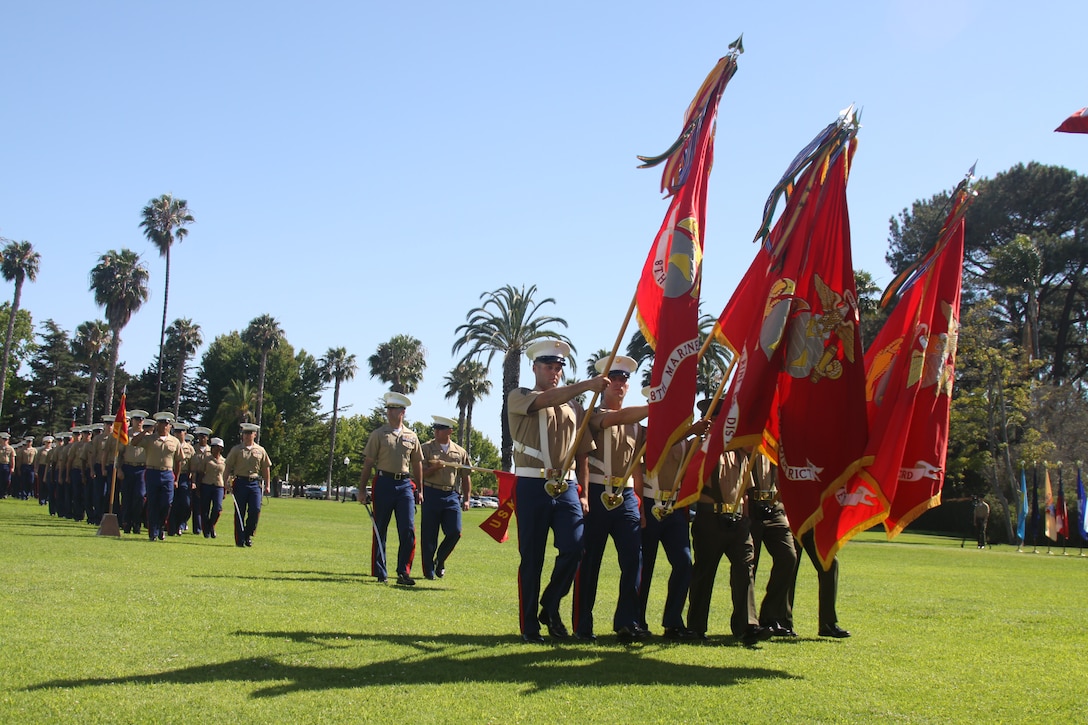 Colors pass as Marine Corps Recruit Depot San Diego and the Western Recruiting Region bid farewell to its commanding general, Maj. Gen. Ronald L. Bailey, who relinquished command to Brig. Gen. Daniel D. Yoo during a change of command ceremony on the commanding general’s lawn, June 30.
