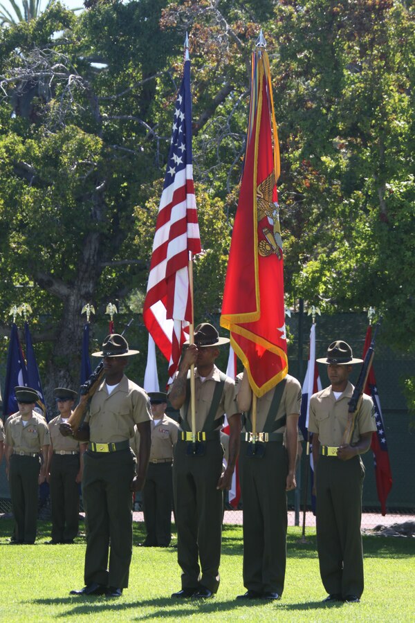 The color guard carries the colors during a change of command ceremony on the commanding general’s lawn, June 30, where Marine Corps Recruit Depot San Diego and the Western Recruiting Region bid farewell to its commanding general, Maj. Gen. Ronald L. Bailey, who relinquished command to Brig. Gen. Daniel D. Yoo.