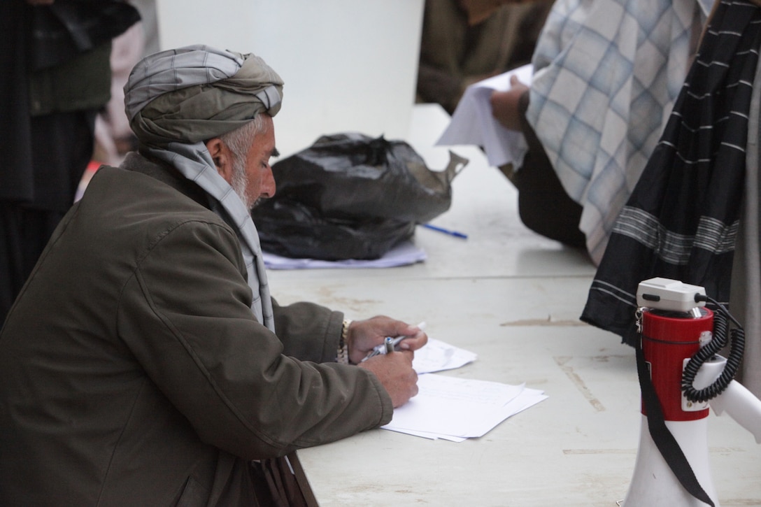 The names of the candidates running for election are written down prior to votes being taken in Marjah, Afghanistan, March 1, 2011.  Elections are being held to elect District Community Representatives for the Marjah District.  Regimental Combat Team 1 is deployed to Helmand Province while in support of the International Security Assistance Force. (U.S. Marine Corps Photo by Cpl Nicholas S. Edinger/Released)