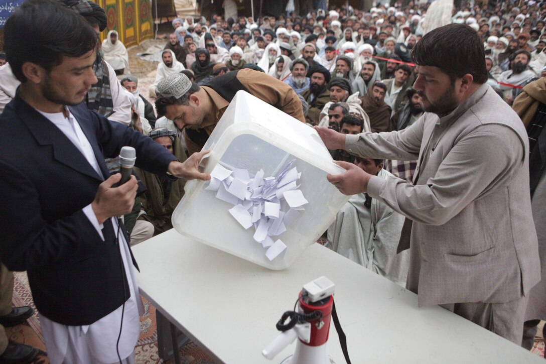 Ballots are counted after local Afghans from all over the Marjah District cast their votes in Marjah, Afghanistan, March 1, 2011.  Elections are being held to elect District Community Representatives for the Marjah District.  Regimental Combat Team 1 is deployed to Helmand Province while in support of the International Security Assistance Force.
