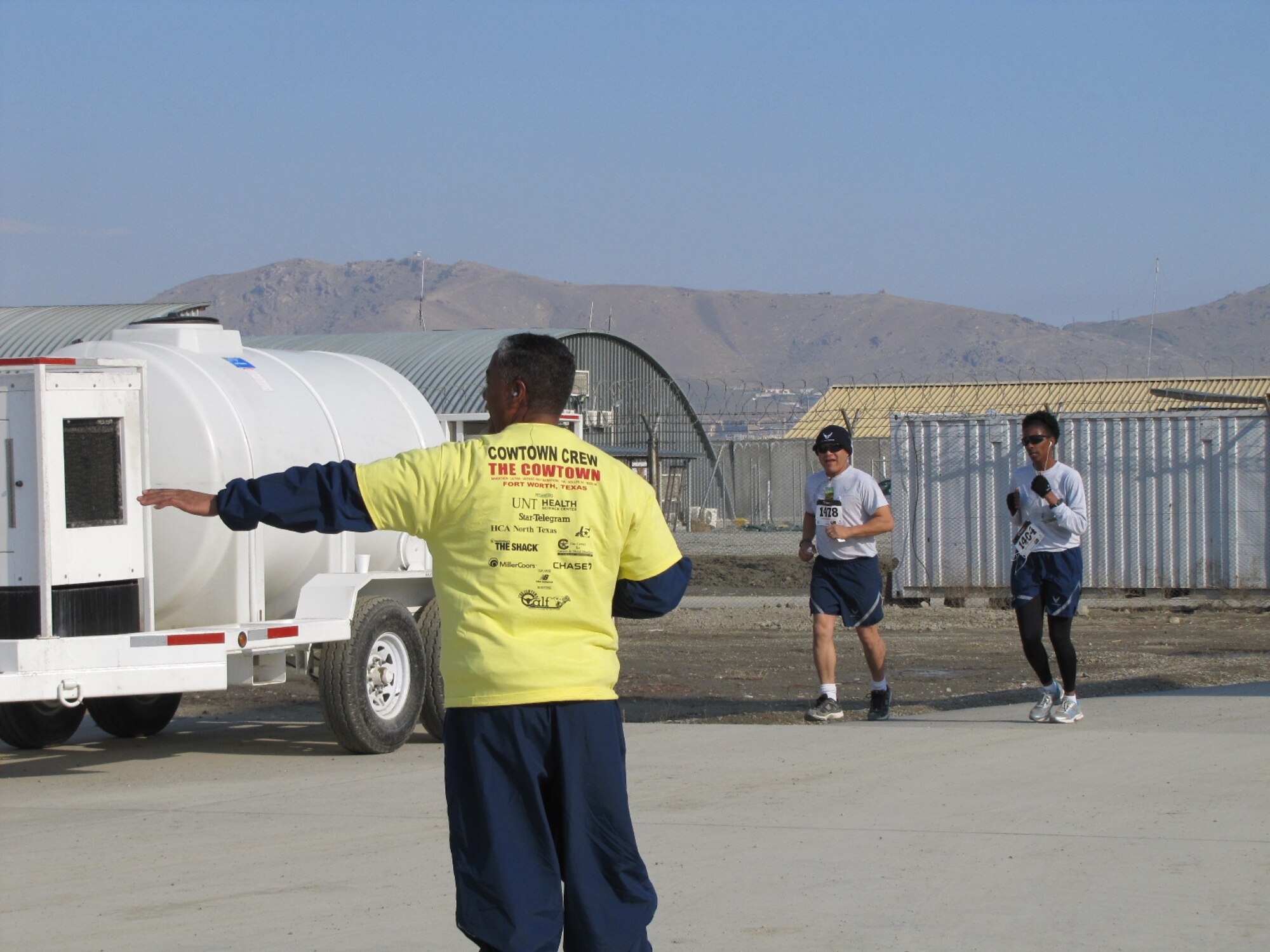 KABUL, Afghanistan - Members of the NATO Air Training Command - Afghanistan and ISAF Joint Command run the annual Fort Worth Cowtown race, one of the largest multi-event road races in the United States, at the Kabul International Airport, Afghanistan Feb 25. (U.S. Air Force photo by Capt. Rob Leese).