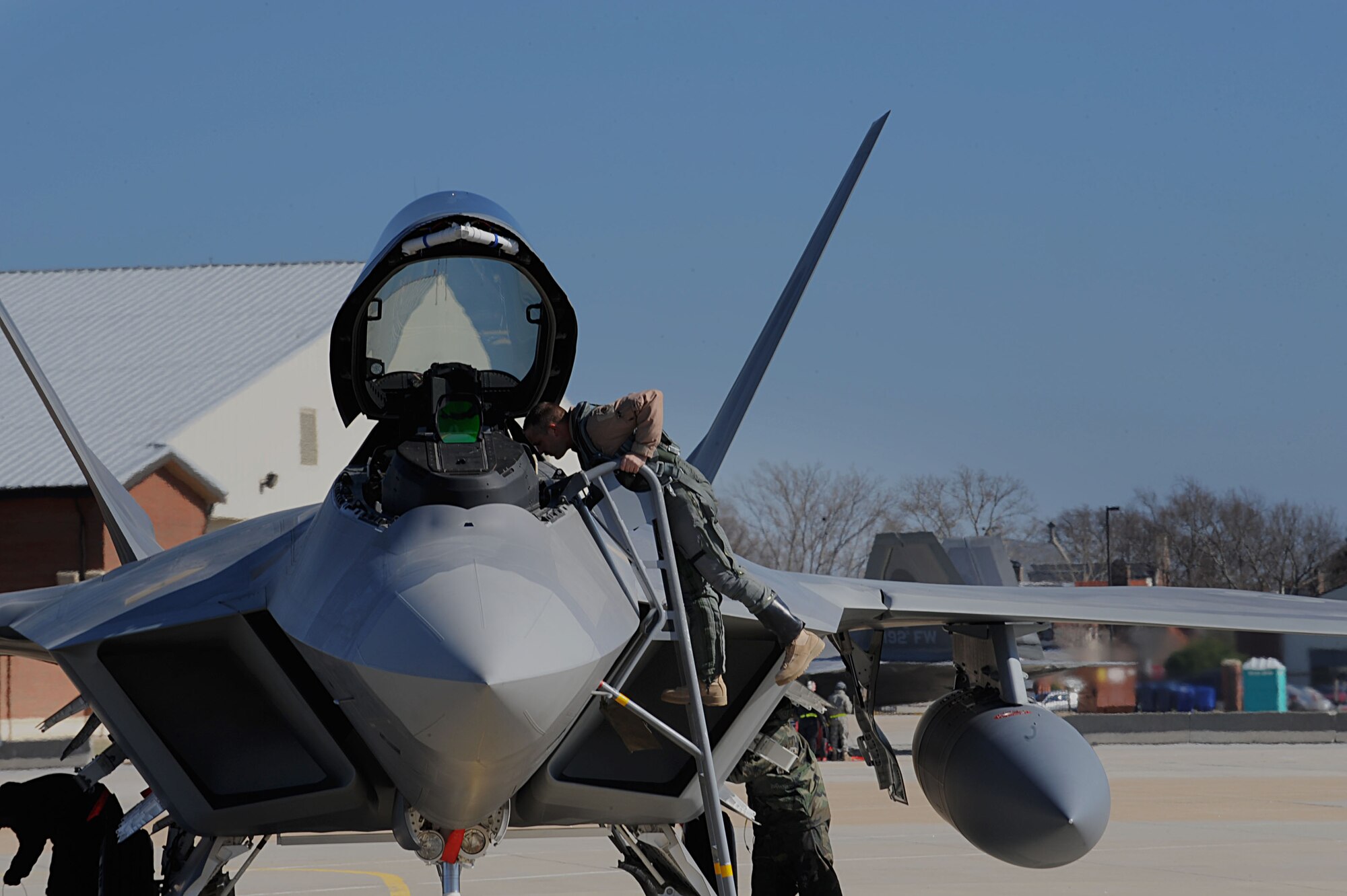 Lt. Col. David Abba, 94th Fighter Squadron commander redeploys to Langley Air Force Base, Va., March 1, 2011. The 94th FS pilots return from Southwest Asia and are greeted by friends and family. (U.S. Air Force photo by Senior Airman Brian Ybarbo/Released)