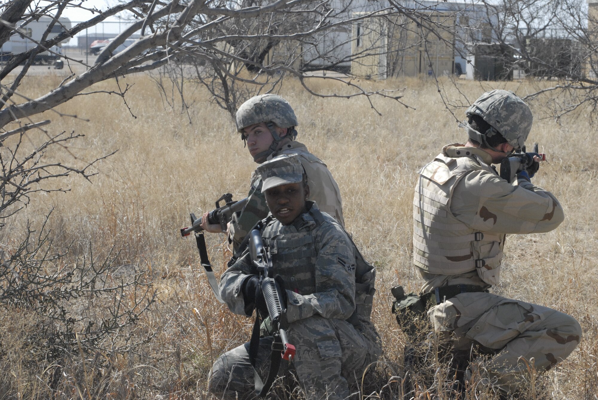 GOODFELLOW AIR FORCE BASE, Texas - Airman 1st Class  Shandra Camacho, 17th Security Forces Squadron, trains Cadets from the Air Force Reserve Officer Training Corps, Angelo State University, different battle tactics Feb. 26 at the Forward Operating Base Camp Sentinel. This was part of a two day training session designed to teach them what military life entails. (U.S. Air Force photo/Senior Airman Anne Gathua)