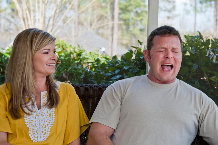 Master Sgt. Robert Disney and his wife, Tess, Feb. 24, 2011, tell the story of their first phone conversation. After a year of dating with a deployment separating them for six months, the two got married one week after Sergeant Disney returned in 2005. Sergeant Disney is the 347th Rescue Group standards and evaluations superintendent. (U.S. Air Force photo/Staff Sgt. Jamal D. Sutter)