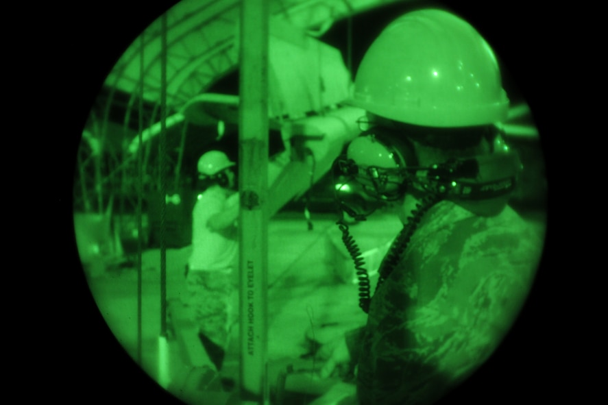 MOODY AIR FORCE BASE, Ga.-- Tech. Sgt. Joseph Mixson, 23rd Equipment Maintenance Squadron crash recovery, uses a cobra crane to remove parts from an A-10C Thunderbolt II during maintenance recently. The A-10 was being inspected after exceeding its gravitation force limit during flight.  (U.S. Air Force photo/Airman 1st Class Benjamin Wiseman)(RELEASED)