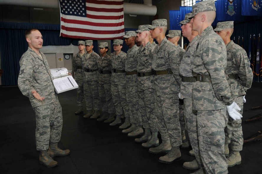 Staff Sgt. Christopher Cenatiempo, a training instructor with The U.S. Air Force Honor Guard, leads a discussion covering drill maneuvers to The USAF Honor Guard trainees Feb. 25, at Joint Base Anacostia-Bolling, Washington, D.C. The new trainees must complete eight weeks of technical training before they are qualified to participate in the Honor Guard’s mission at Arlington National Cemetery. (U.S. Air Force photo by Senior Airman Christopher Ruano)