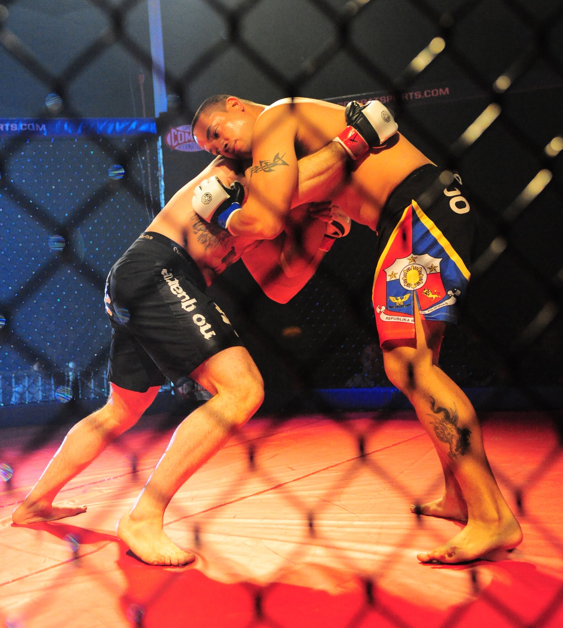 COLUMBIA, S.C. - Staff Sgt. Ferdinando Acerra grapples his opponent at the Caged Chaos mixed martial arts competition at Jamil Temple here Feb. 26, 2011. Sergeant Acerra is an F-16 crew chief maintenance instructor for the 20th Maintenance Operations Squadron out of Shaw Air Force Base, S.C. (U.S. Air Force photo/Airman 1st Class Daniel Phelps (Released))