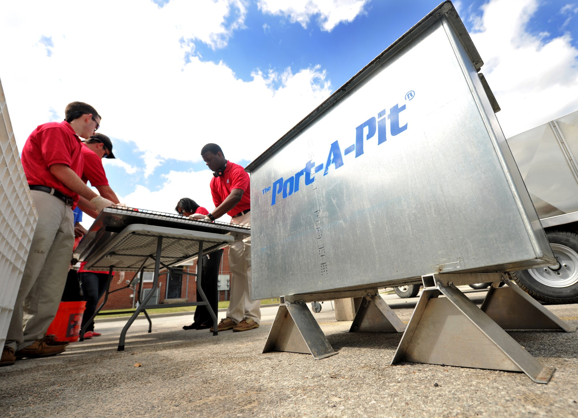 VALDOSTA, Ga.-- A metal crate holds grill racks during a cookout held for the local community at a ribbon cutting ceremony for the new Skills Success Center in downtown Valdosta Feb. 28. Airmen from Moody came to show support for the event after they set a record number for packaging 400 food boxes in three hours a week prior. (U.S. Air Force photo/Airman 1st Class Joshua Green)(RELEASED)
