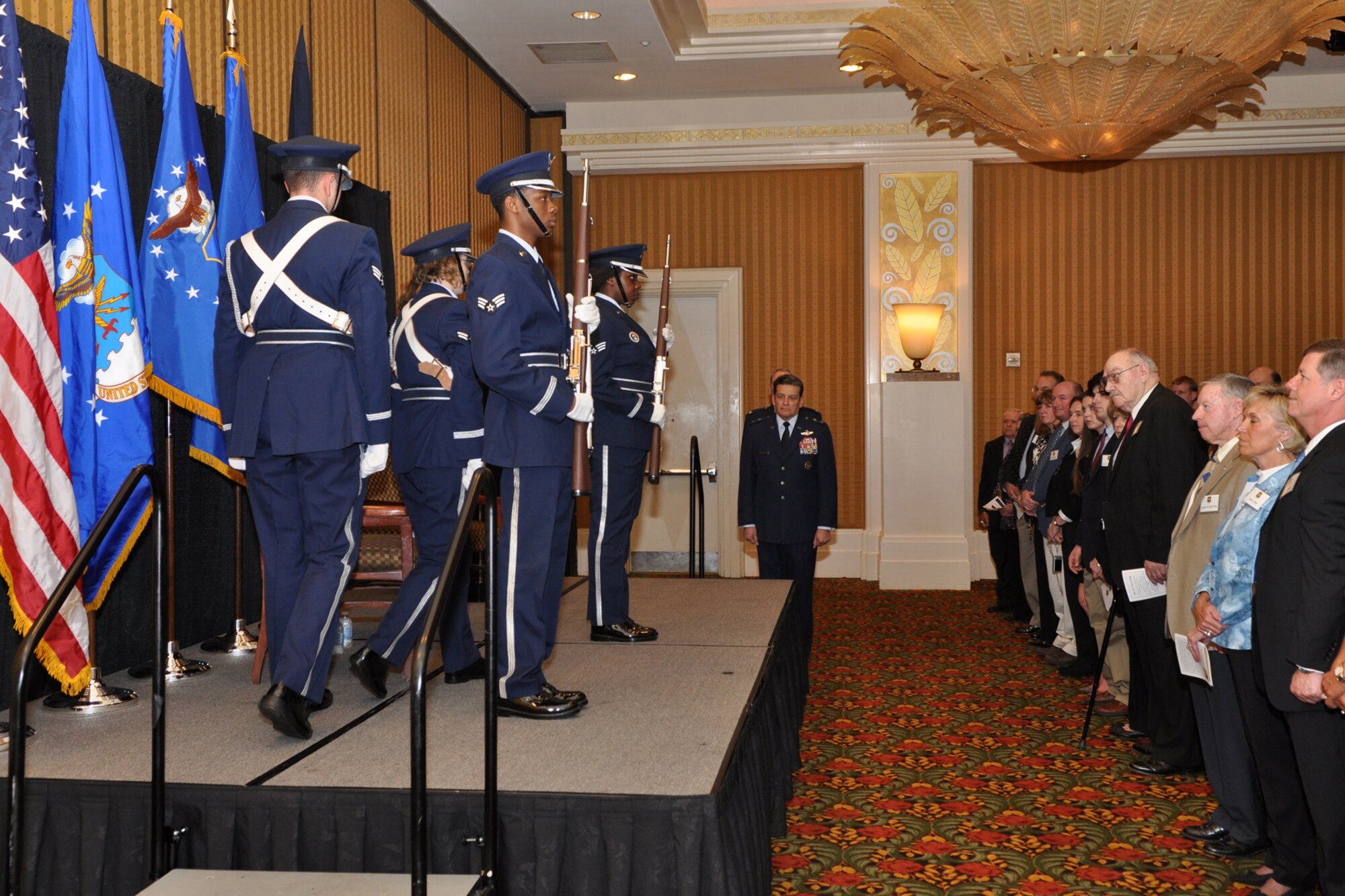 Members of the Barksdale Air Force Base Honor Guard post the colors during the pinning-on ceremony for Brig. Gen. John J. Mooney III, at the Eldorado Hotel in Shreveport, La., Feb. 25, 2010. General Mooney is the commander of the 307th Bomb Wing at Barksdale Air Force Base, La. Maj. Gen. Frank Padilla, commander, 10th Air Force, was the presiding official for the ceremony. Approximately 70 family members and friends were in attendance, some traveling in from as far away as Maine for the event. (Photo by Jeff Walston)   