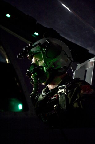 NELLIS AIR FORCE BASE, Nev. --  Maj. Eric Nodland, 107th Fighter Squadron pilot, Selfridge  Air National Guard Base Mich., conducts pre-flight checks in the cockpit of an A-10 Thunderbolt II before a training mission during Red Flag 11-3, Feb. 24.  Red Flag is a realistic combat training exercise involving the air forces of the United States and its allies. The exercise takes place north of Las Vegas on the Nevada Test and Training Range--the U.S. Air Force's premier military training area with more than 12,000 square miles of airspace and 2.9 million acres of land. (U.S. Air Force photo by Tech. Sgt. Michael R. Holzworth)