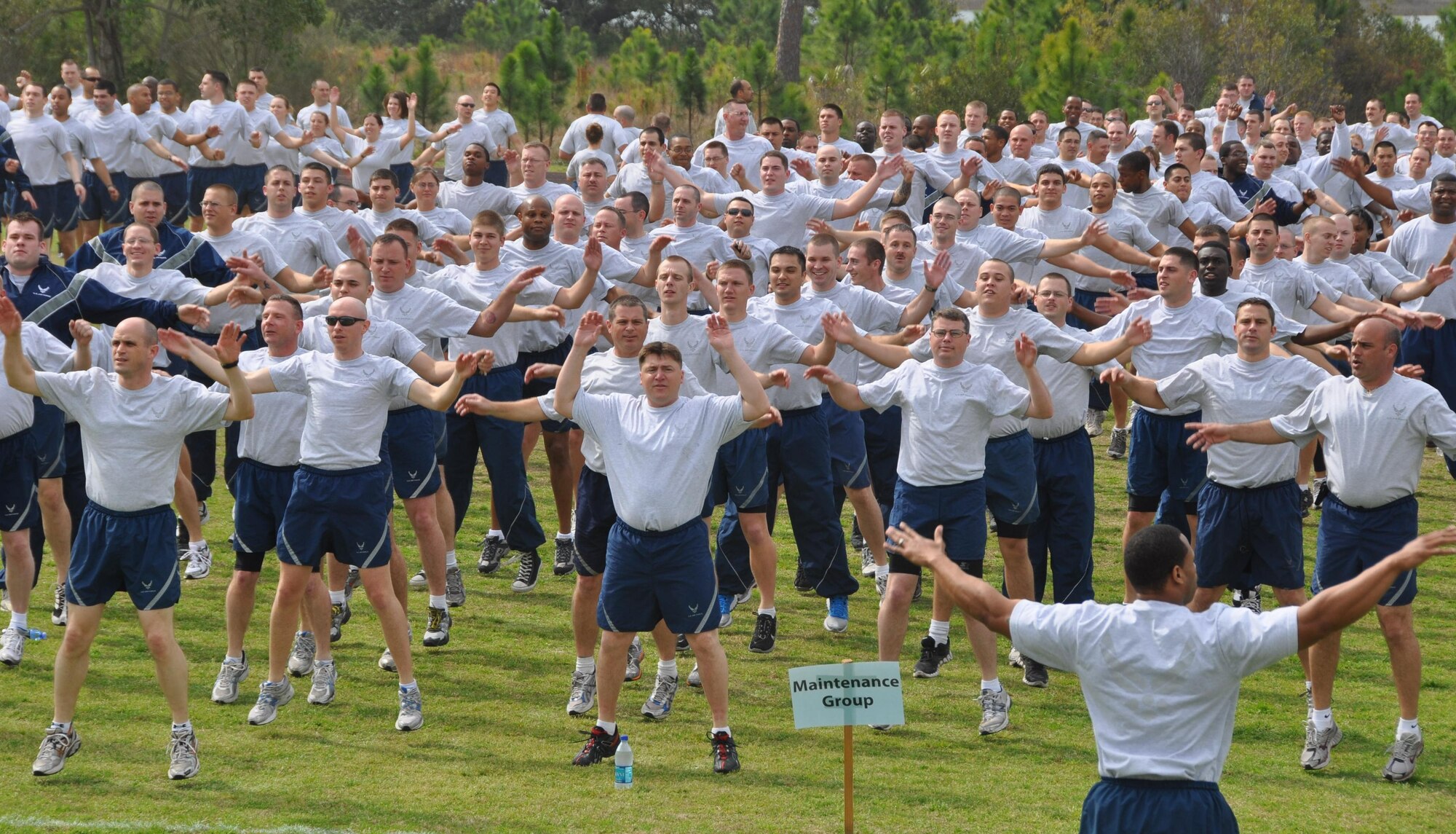Airmen perform warm-up exercises in preparation for the wing formation run during Winter Wingman Day 2011 Feb. 25 at the base track. (U.S. Air Force photo/Senior Airman Rachelle Elsea)